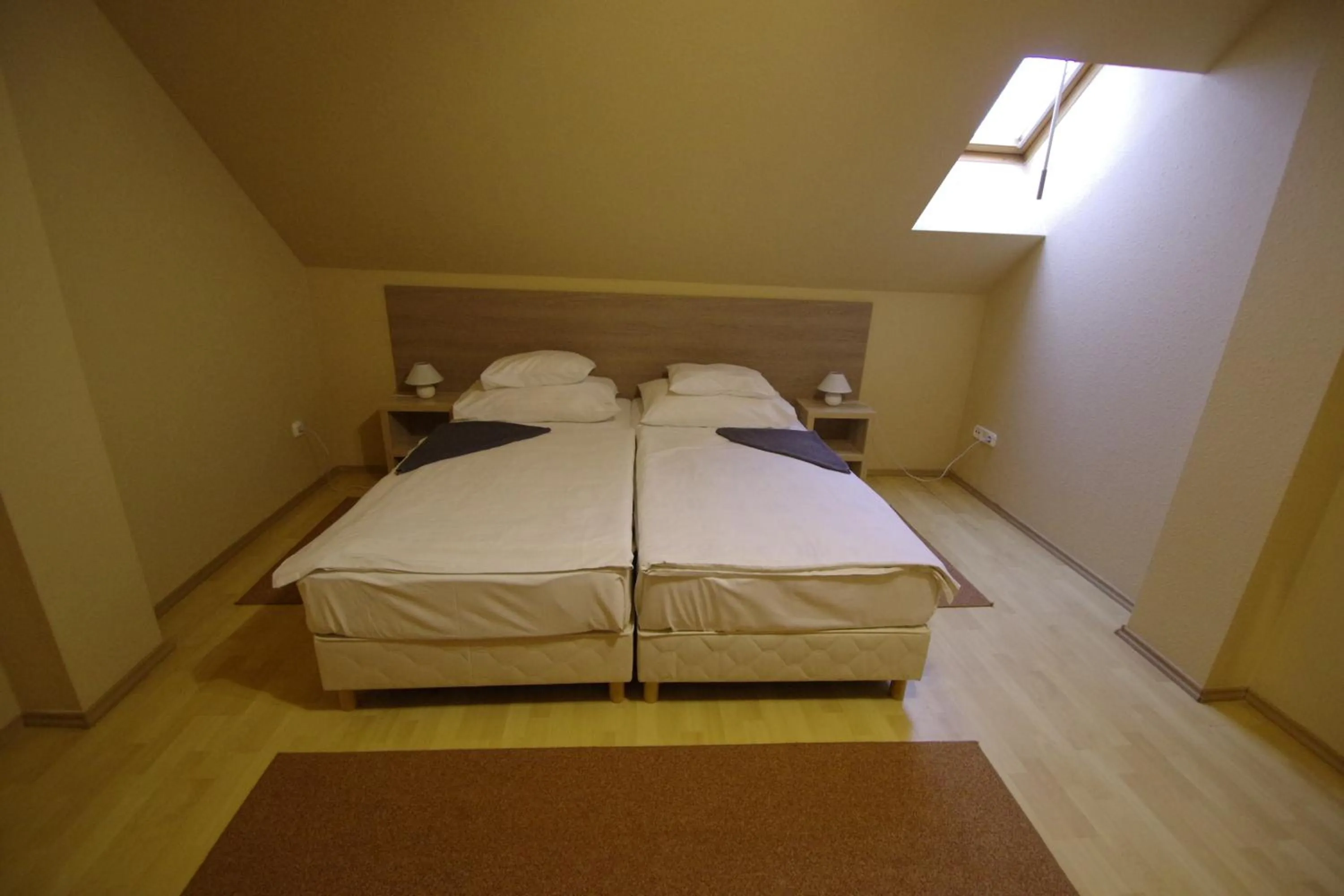 Photo of the whole room, Bed in Hotel Vadászkürt Superior