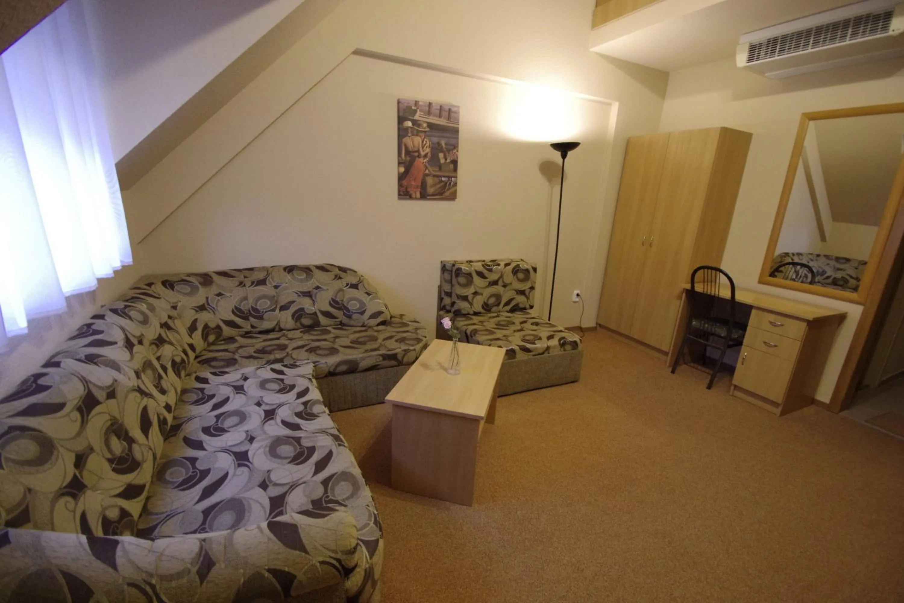 Living room, Bed in Hotel Vadászkürt Superior