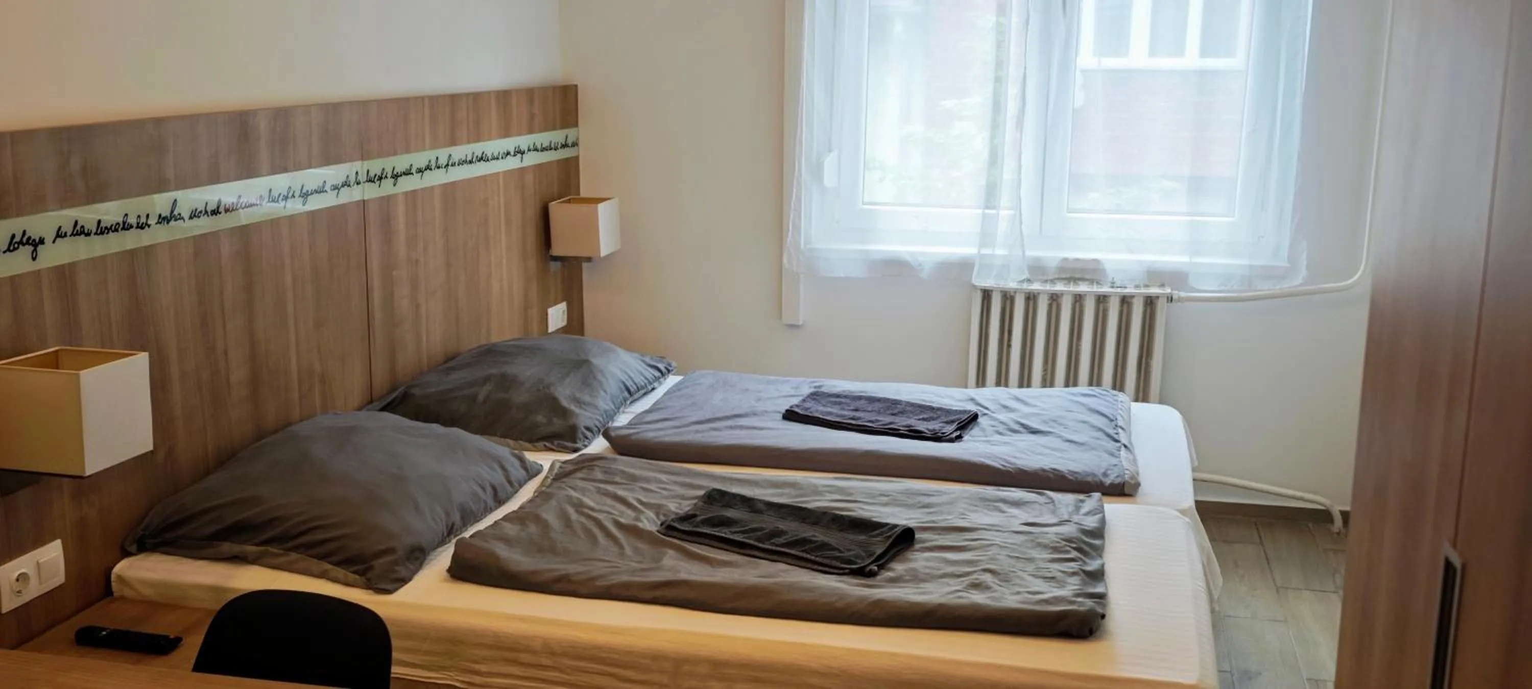 Bed in Apartments Leslie