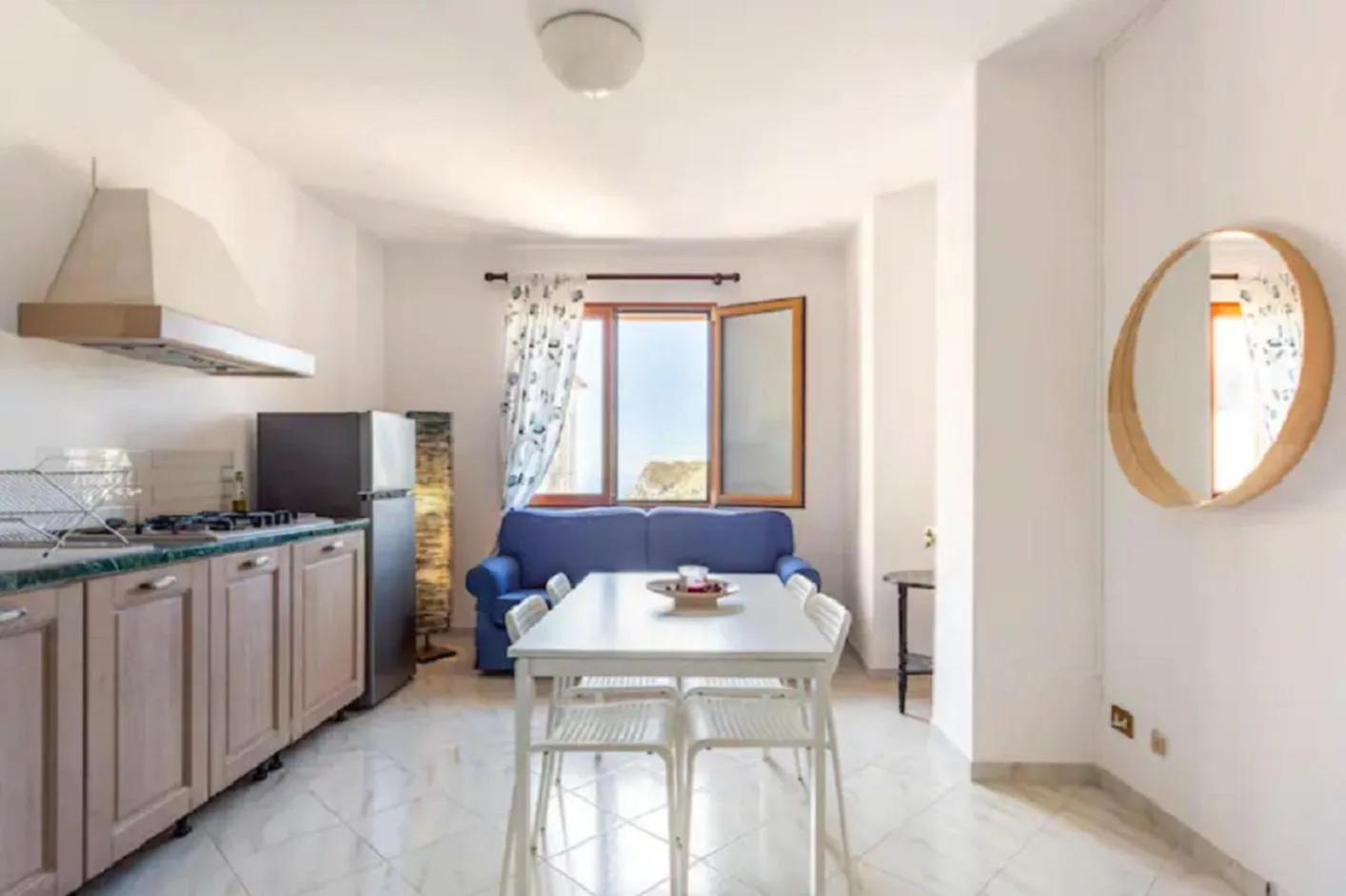 Living room, Bed in Villa Mariel Suites & Apartment