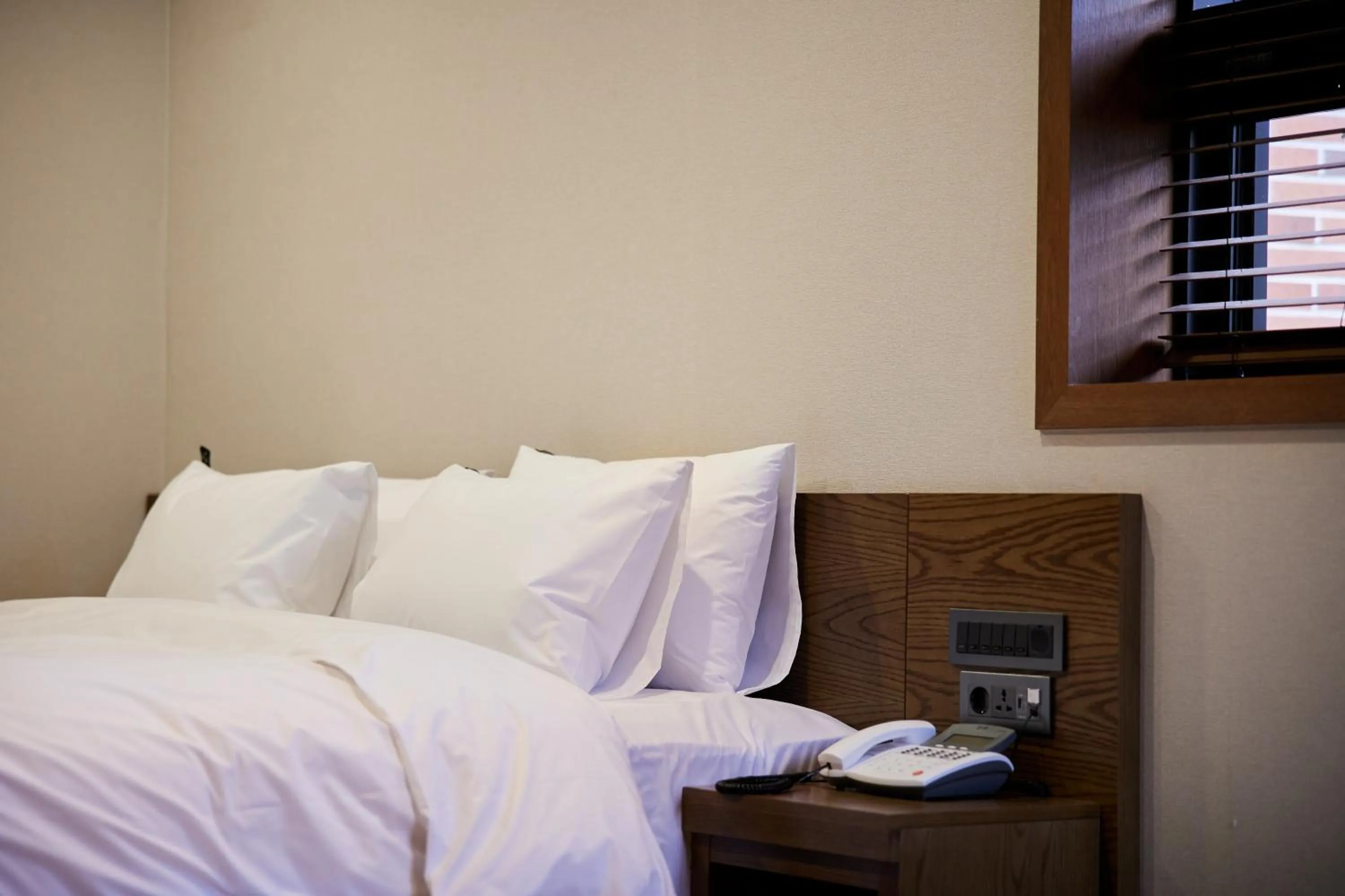 Seating area, Bed in Hotel The Star