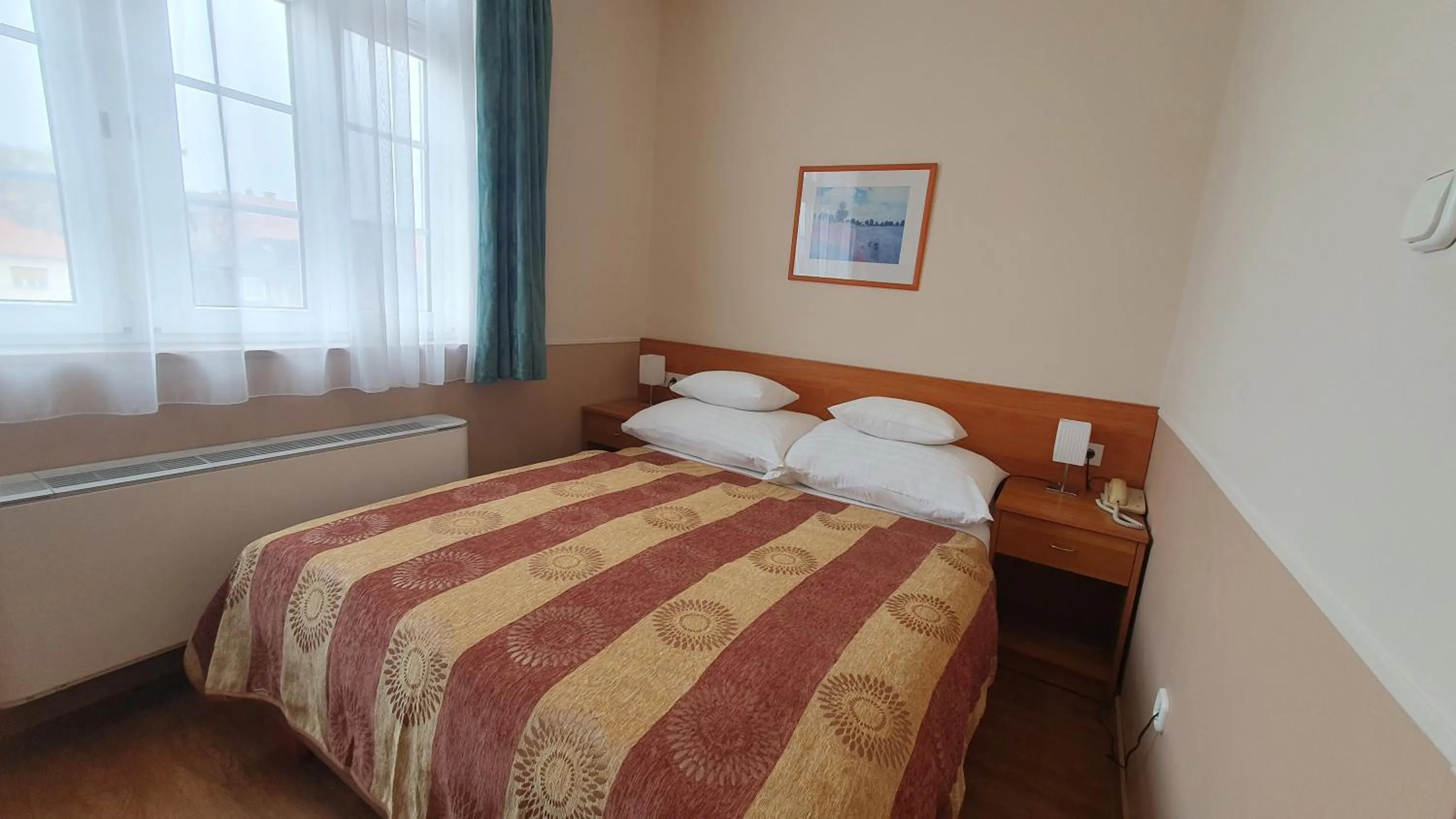 Bed in Hotel Baross