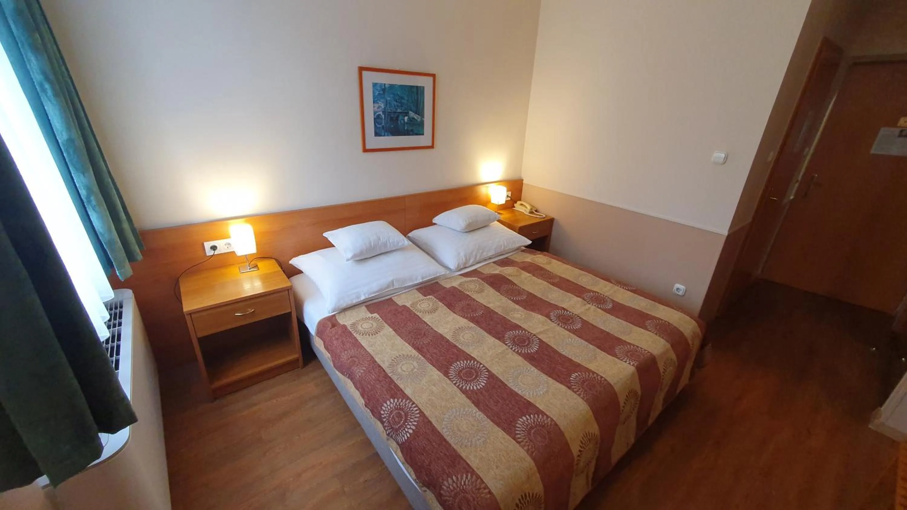 Bed in Hotel Baross