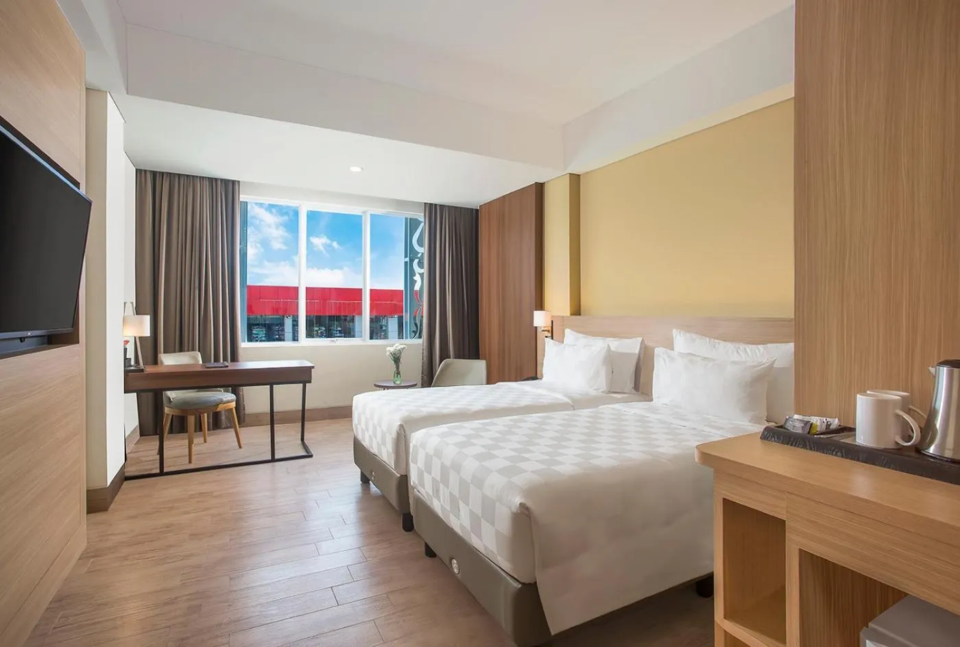 Bathroom, Bed in Swiss-Belhotel Cendrawasih, Biak