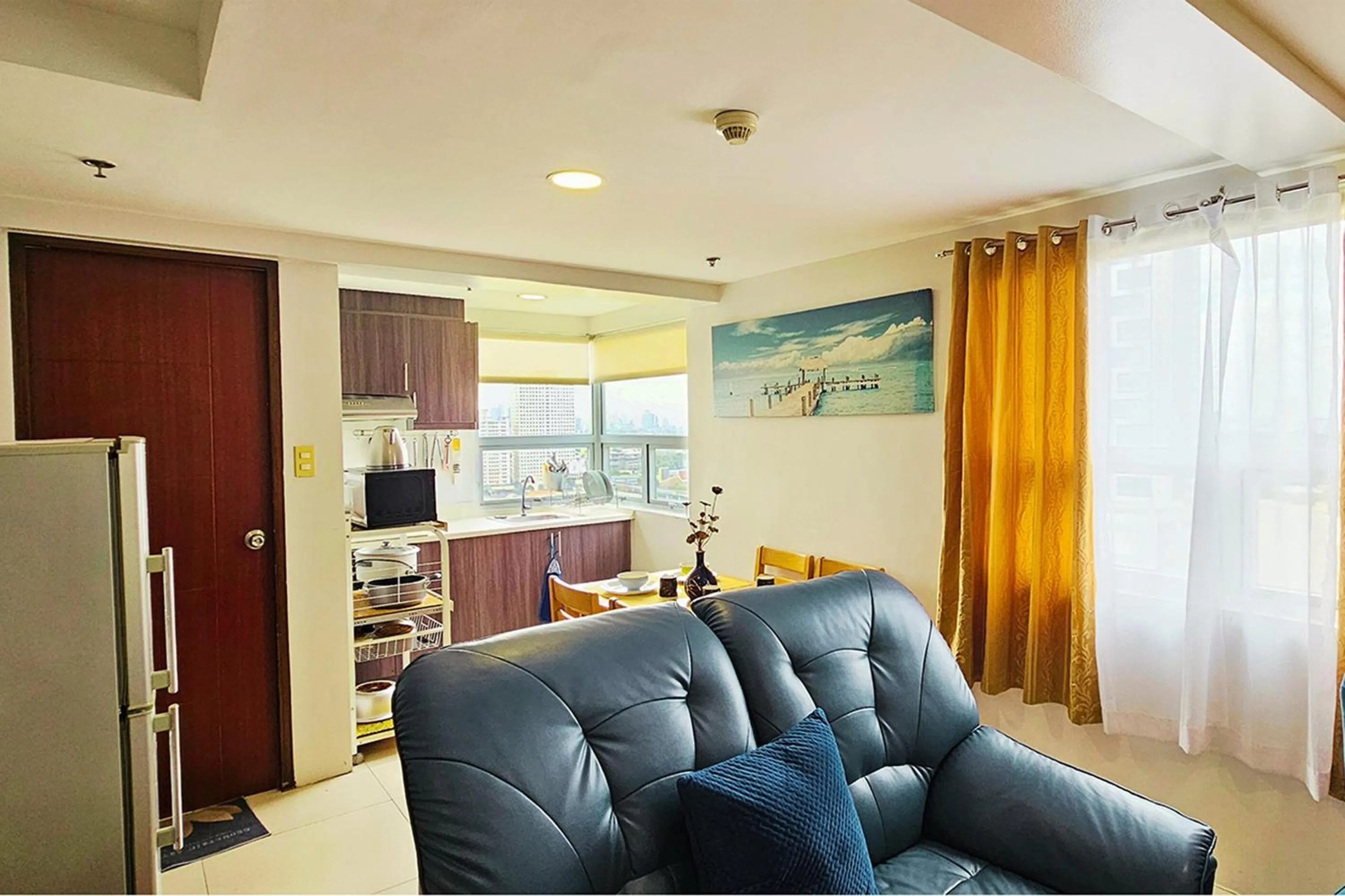 Kitchen or kitchenette in Gilmore Tower Suites By SMS Hospitality