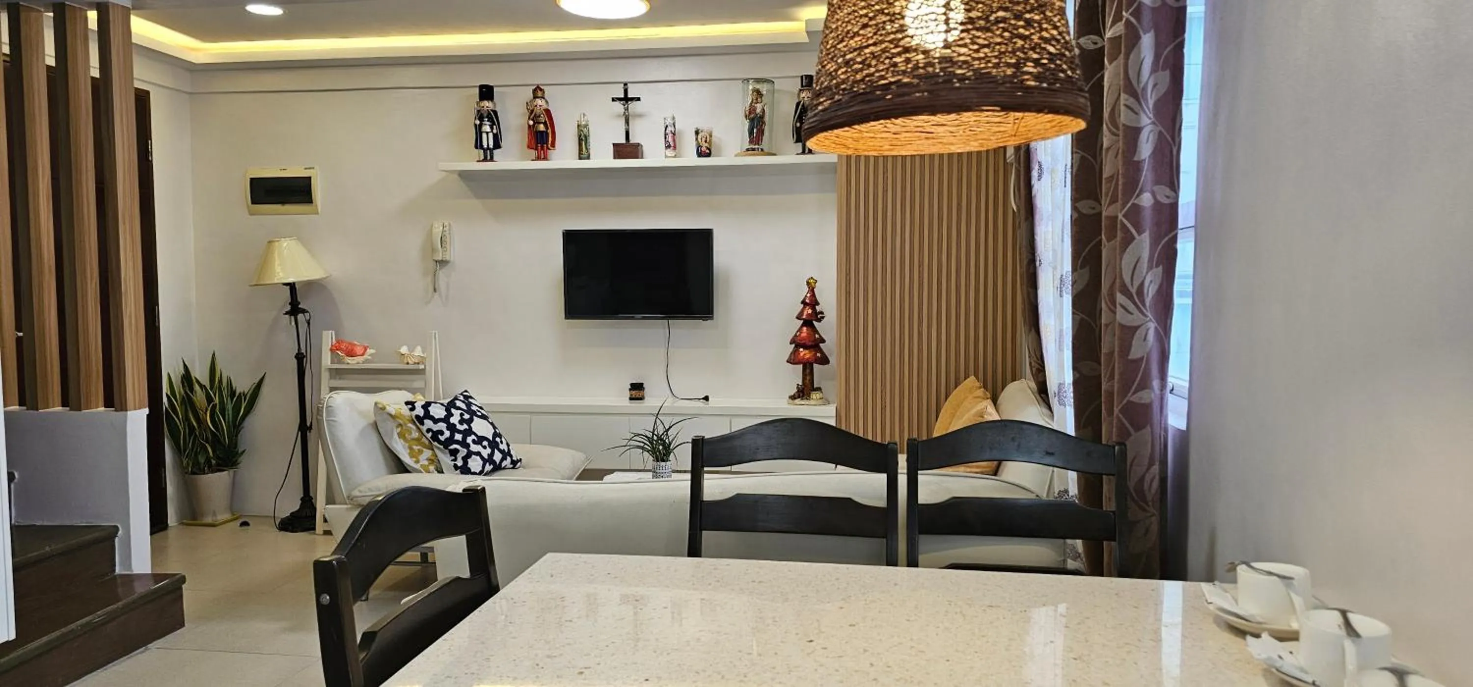 Living room in Gilmore Tower Suites By SMS Hospitality