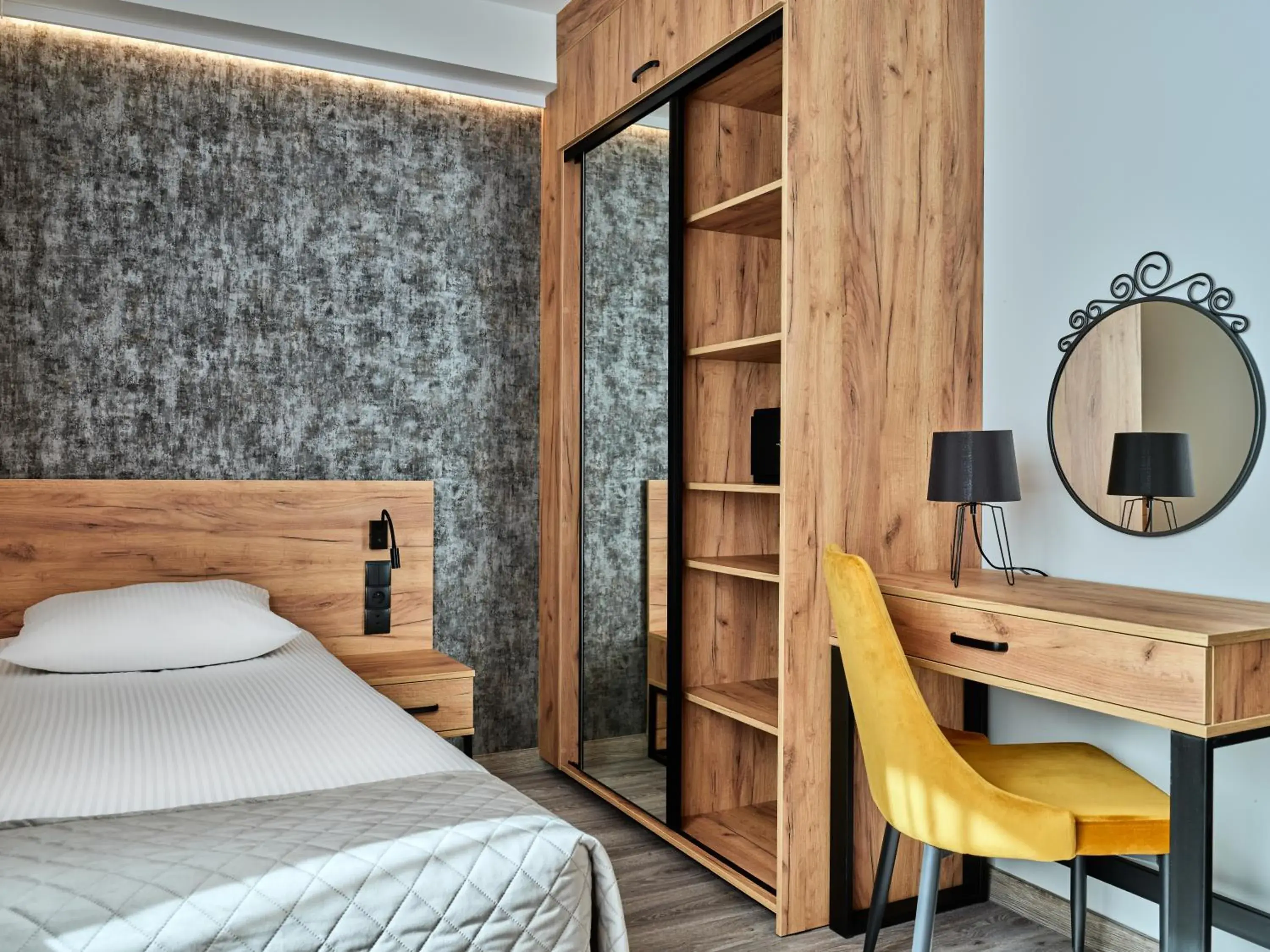 Bed in 1891 Garni Hotel Bed in 1891 Garni Hotel