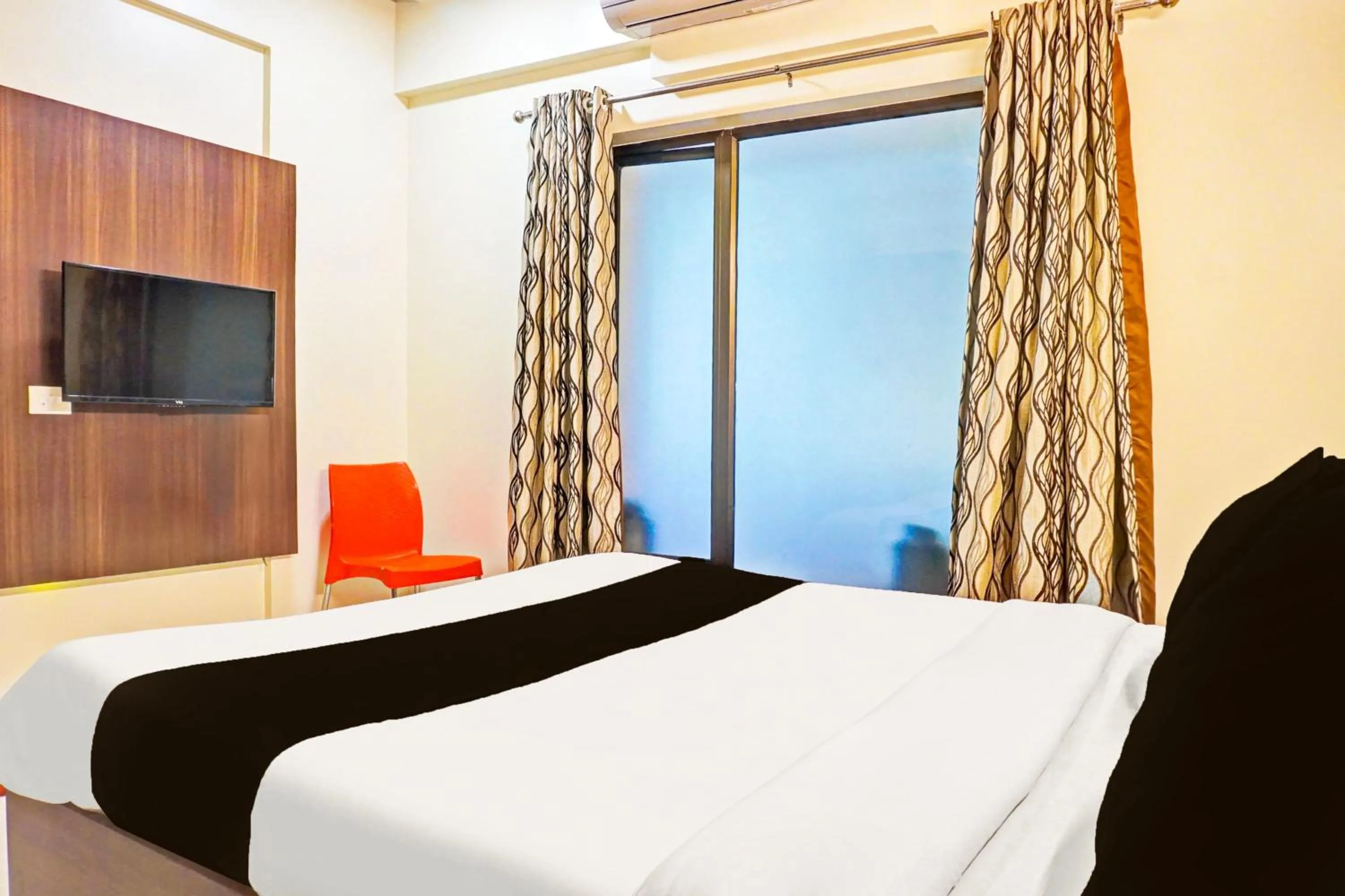 Bedroom in Hotel O Pearl Inn