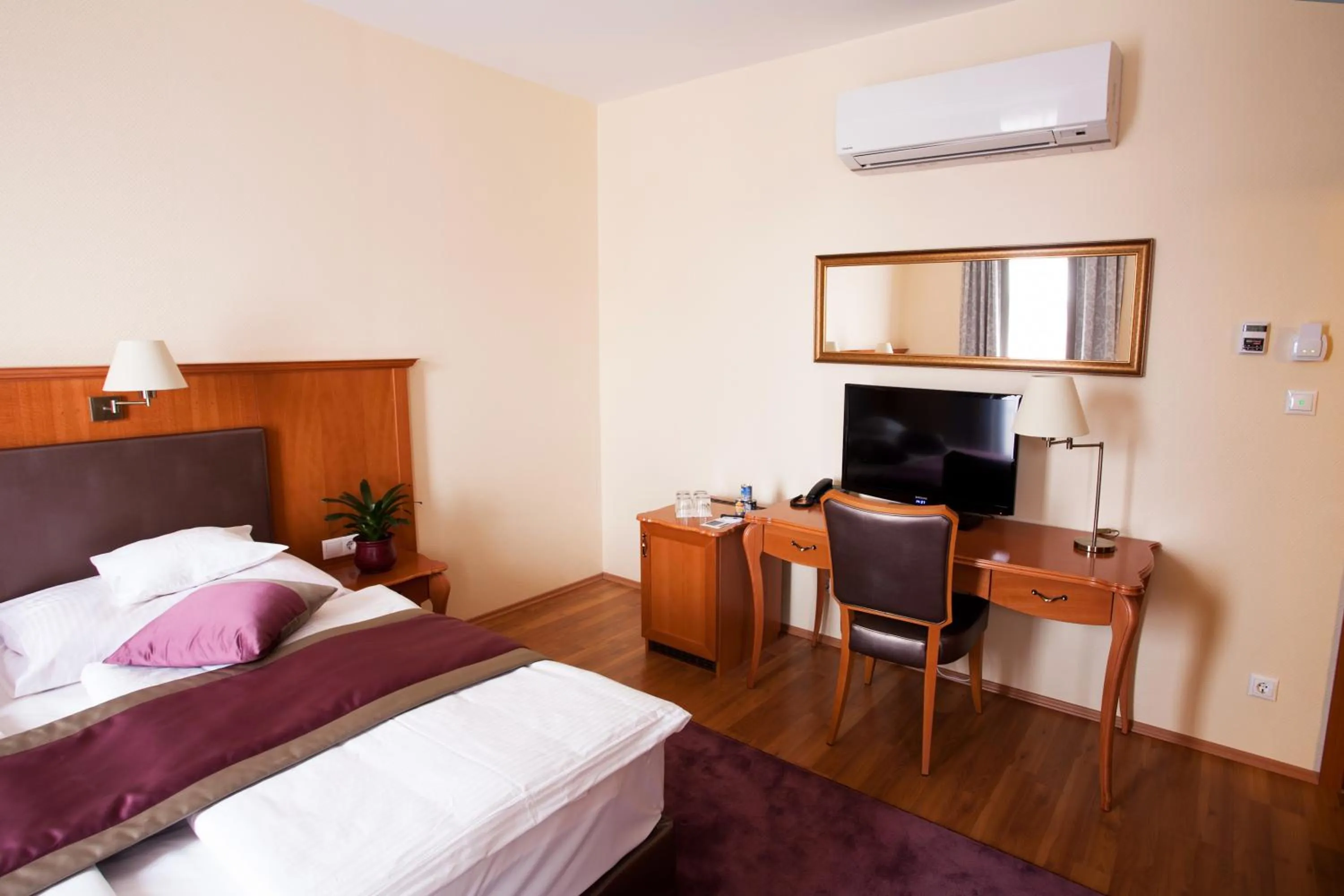 Bed in Pannonia Hotel