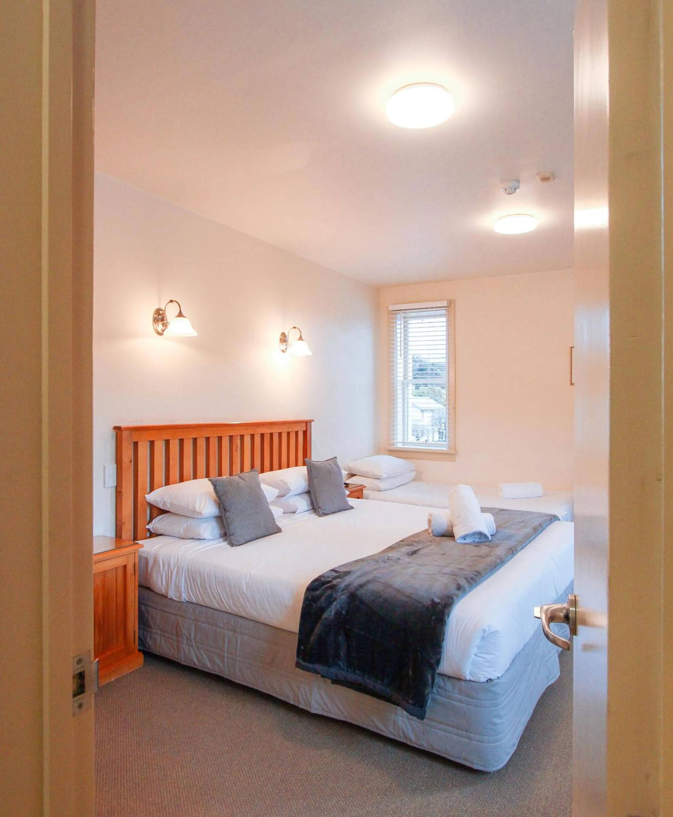Bed in The Grand Hotel & Bar - Akaroa