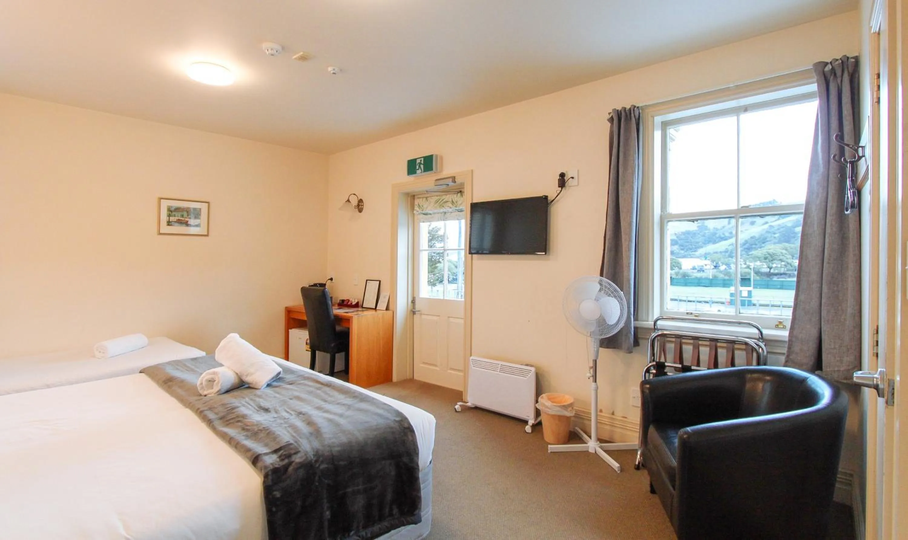 Bed in The Grand Hotel & Bar - Akaroa