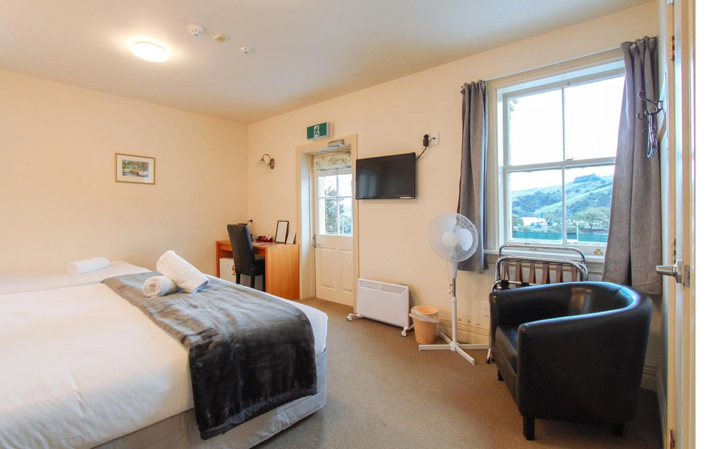 Bed in The Grand Hotel & Bar - Akaroa
