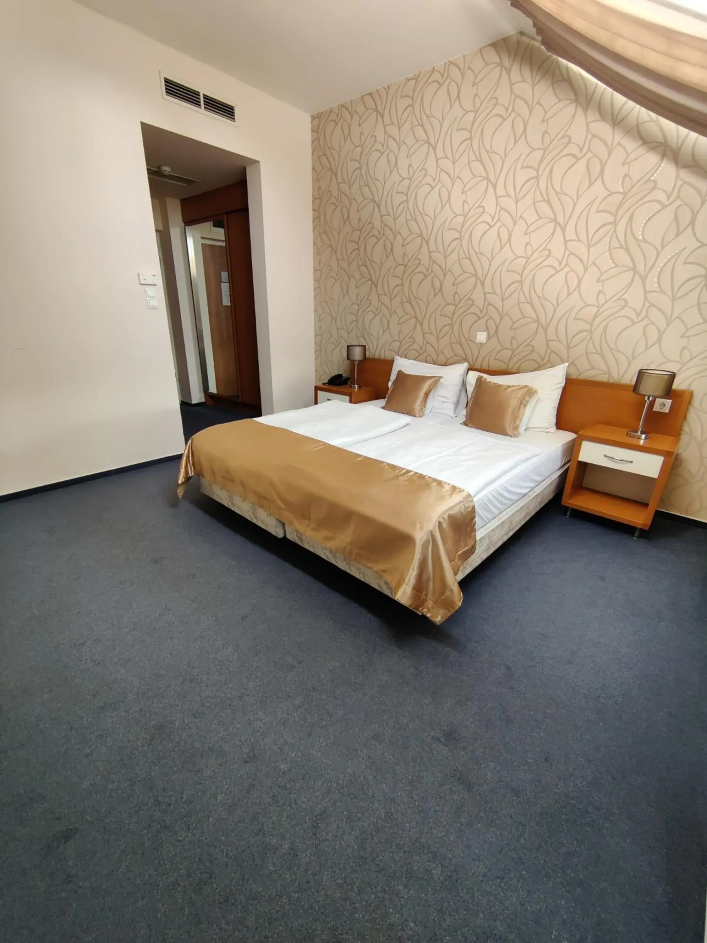 Bed in Boutique Hotel Sopianae Bed in Boutique Hotel Sopianae