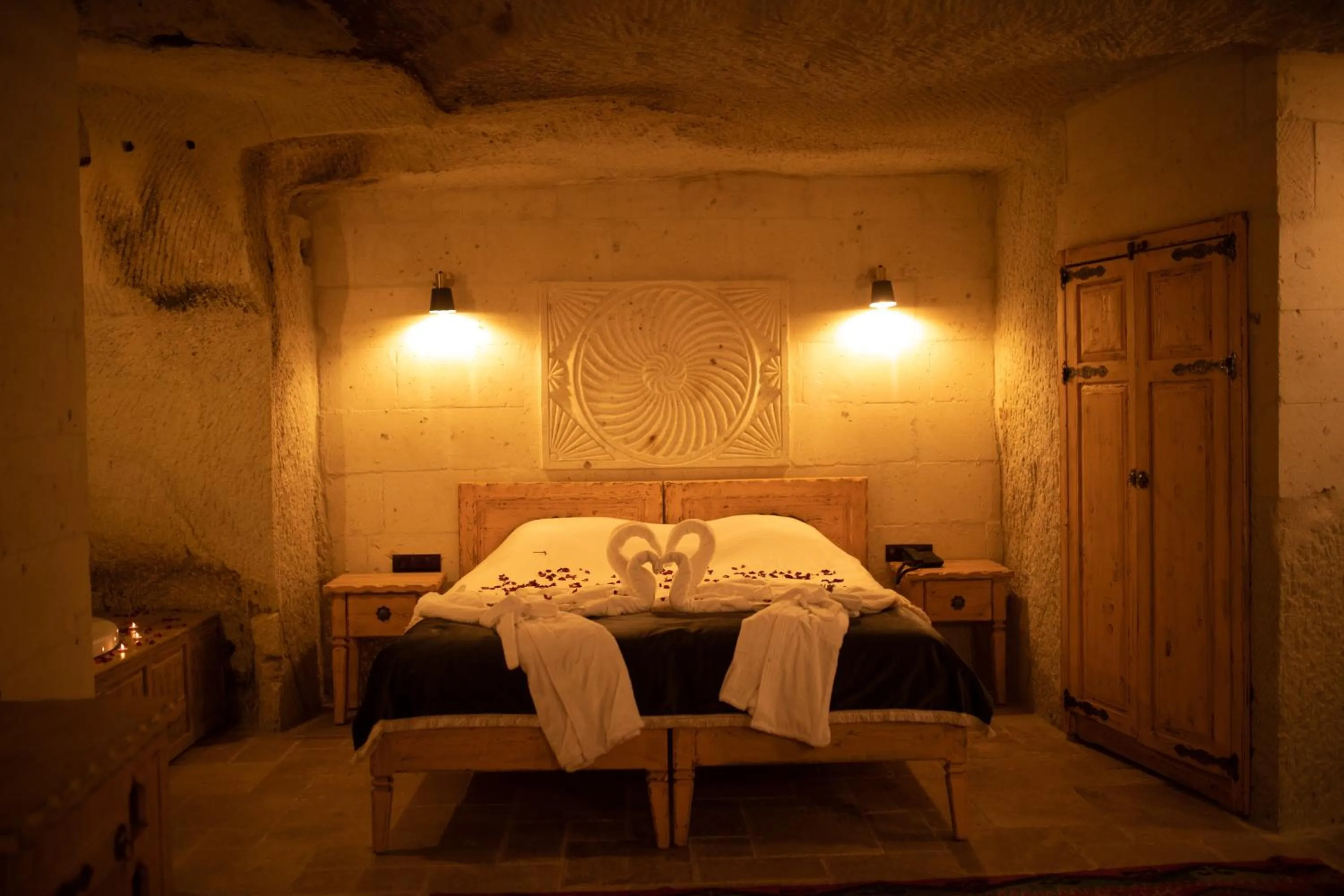 Bed in Pome Granate Cave Hotel