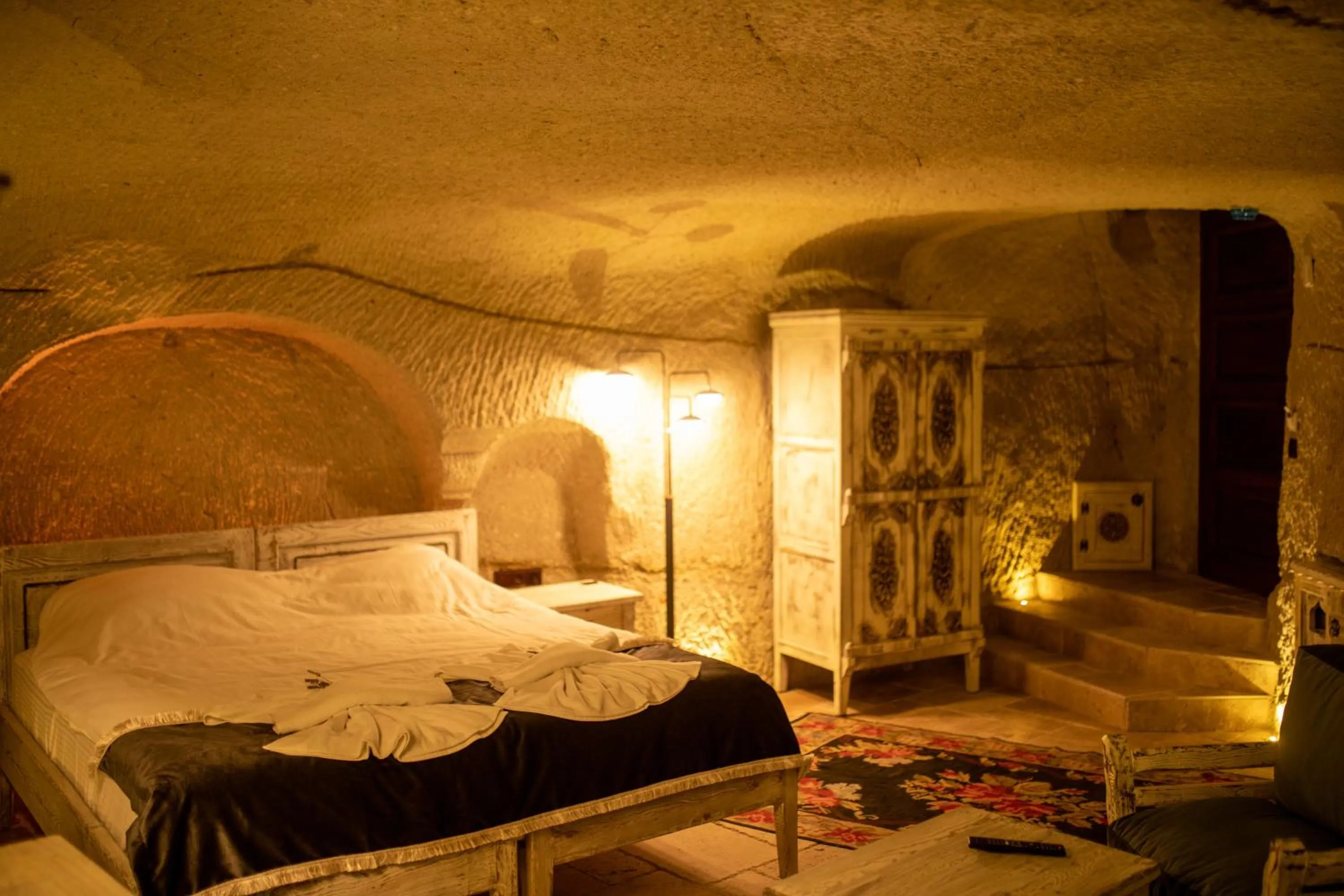Bed in Pome Granate Cave Hotel