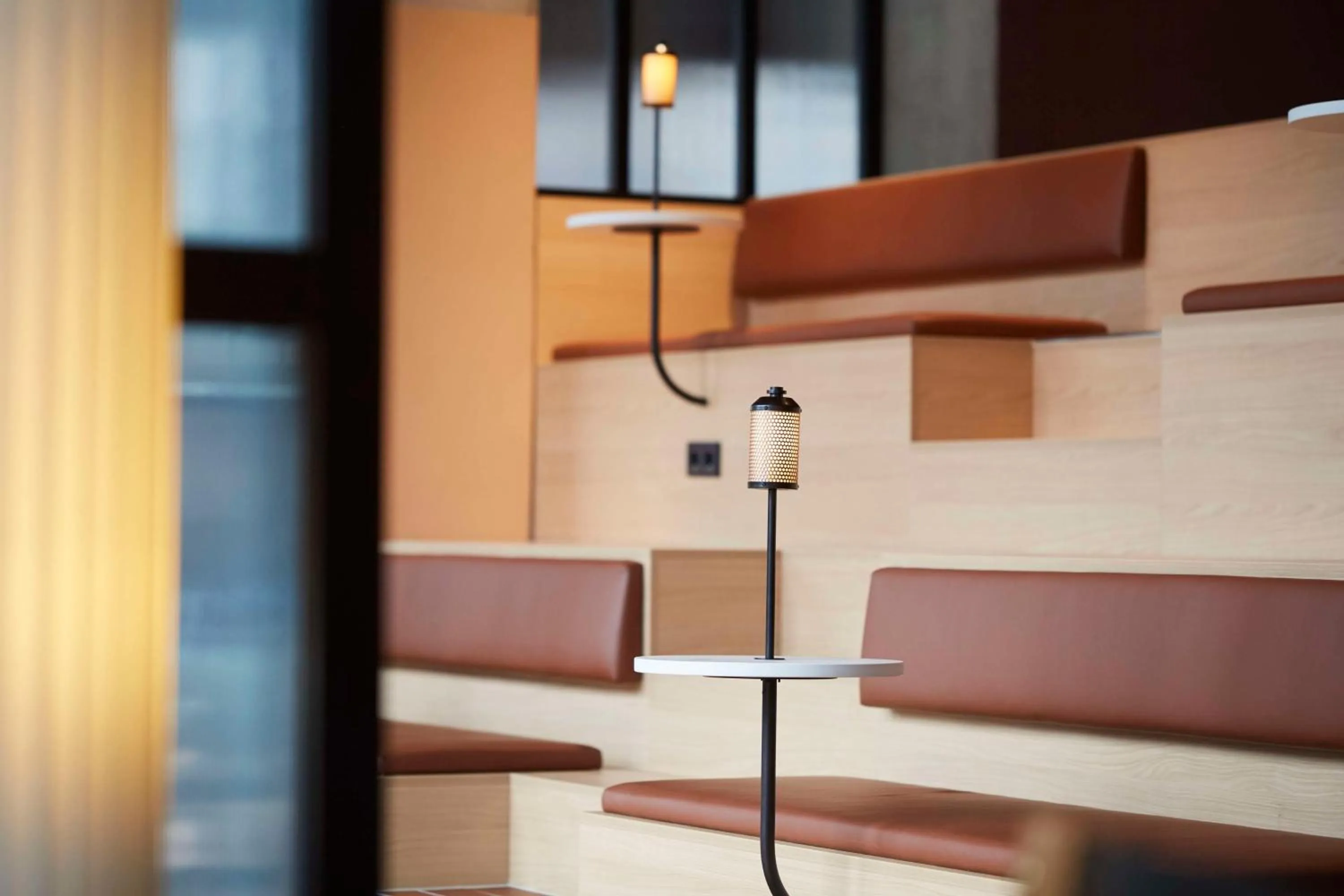 Communal lounge/ TV room in Scandic München Macherei