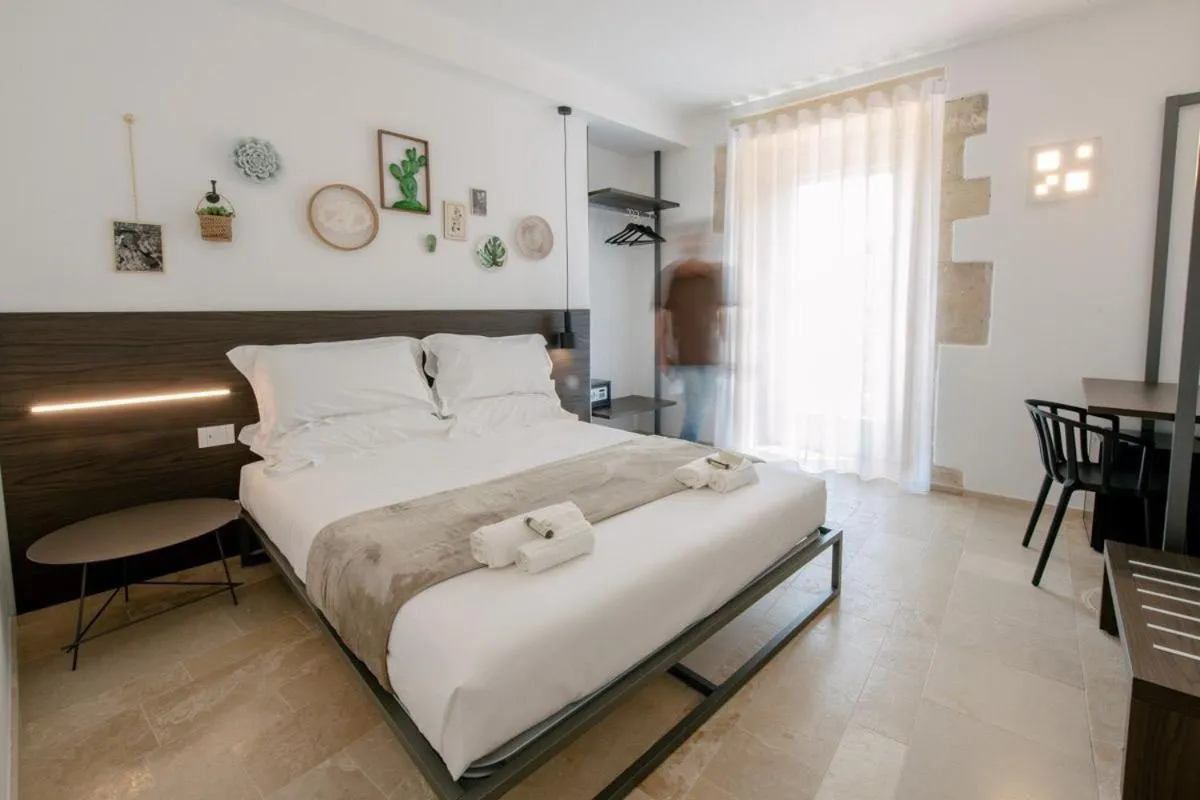 Bed in IBLA ROOMS