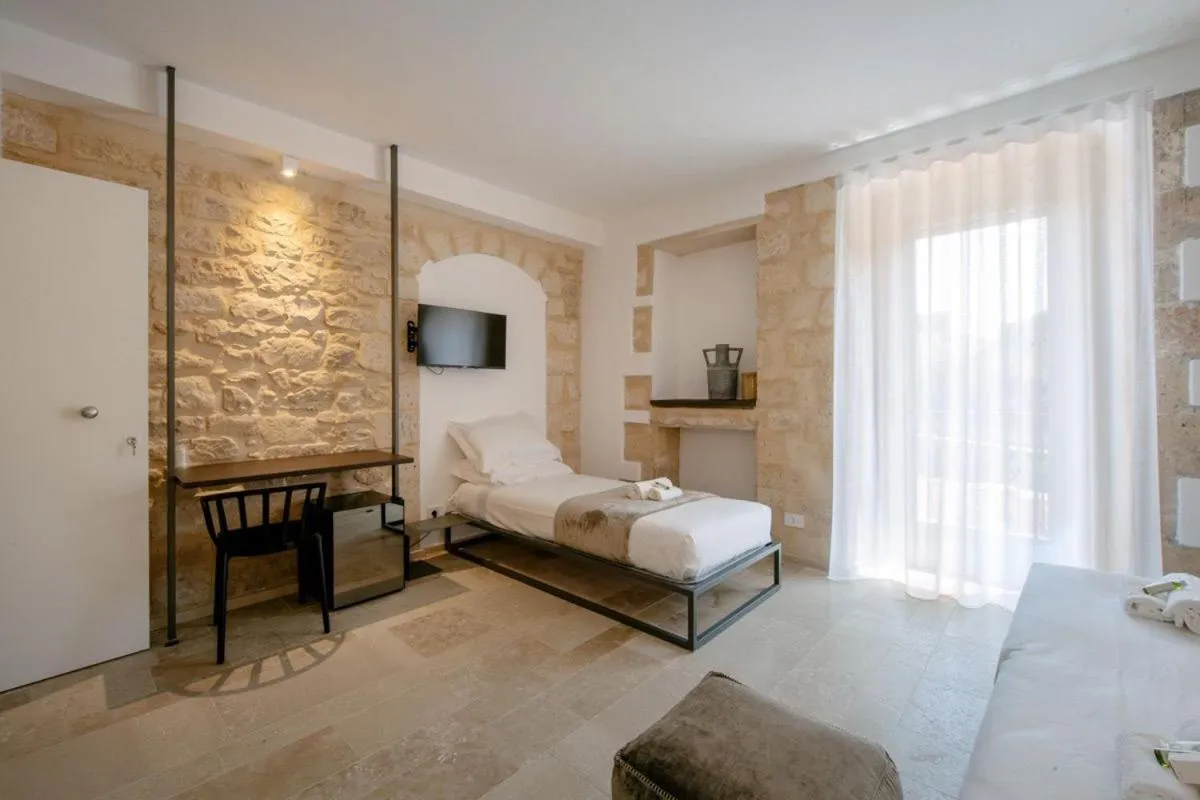 Bed in IBLA ROOMS