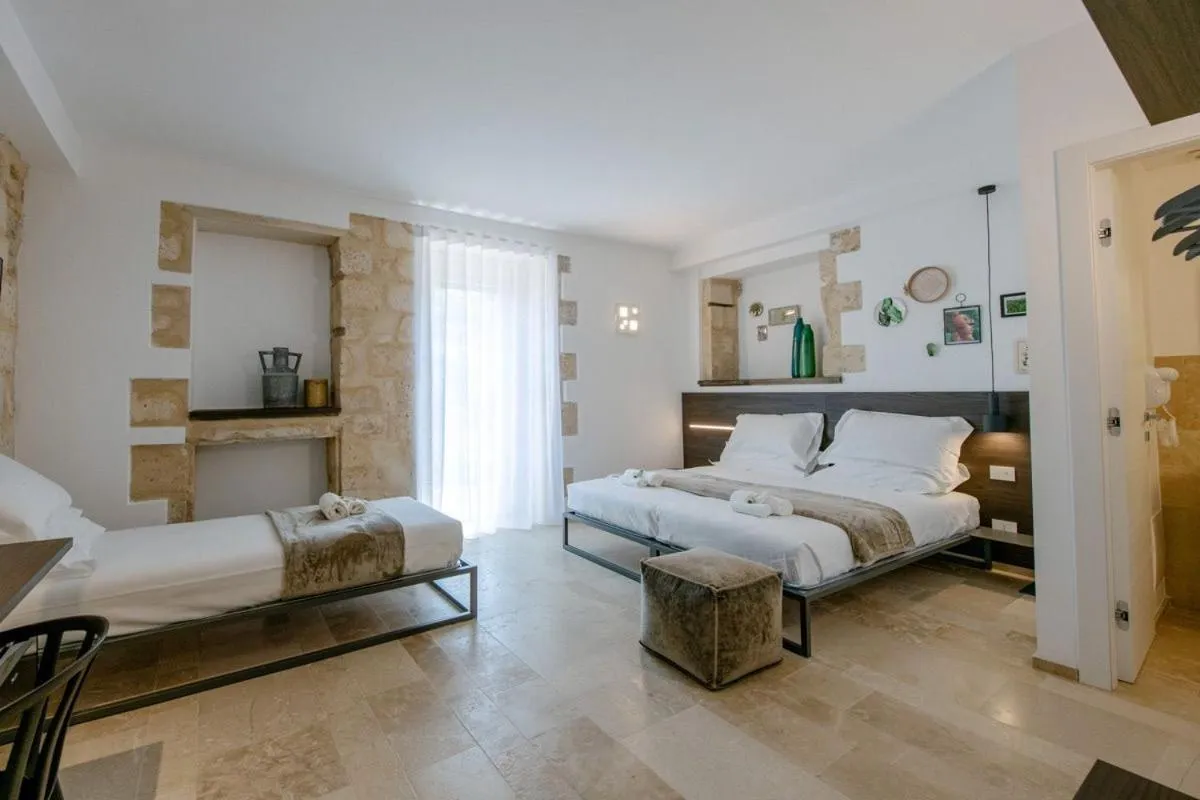 Bed in IBLA ROOMS