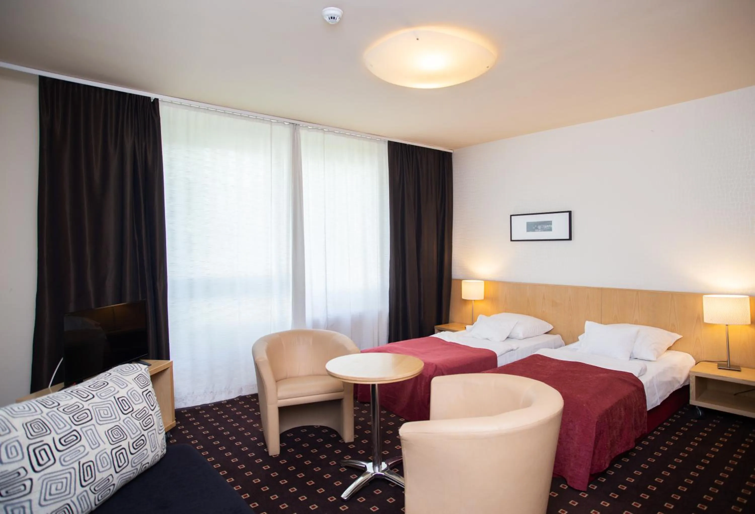 Bed in Hotel Laterum