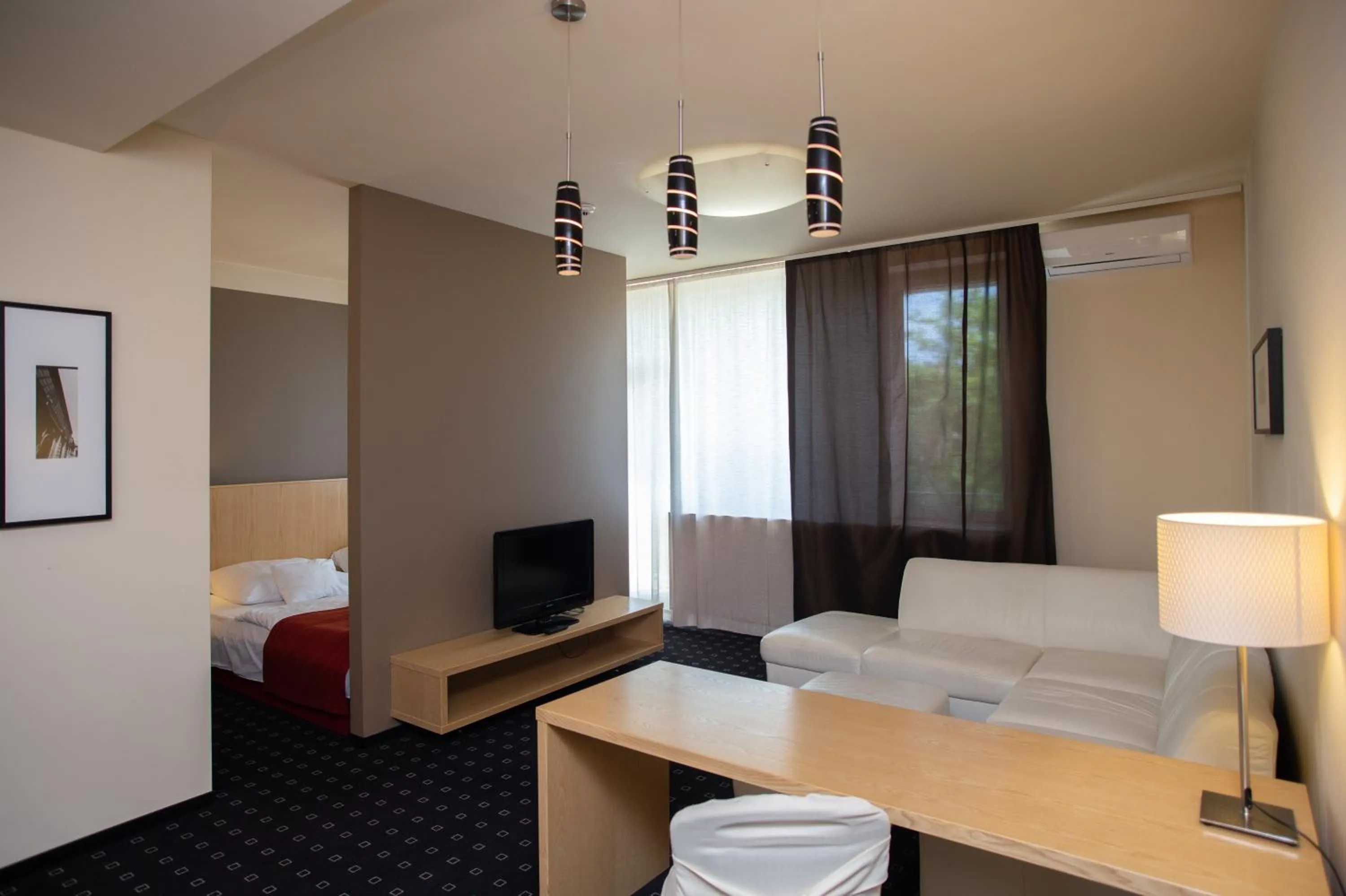 Balcony/Terrace, Bed in Hotel Laterum