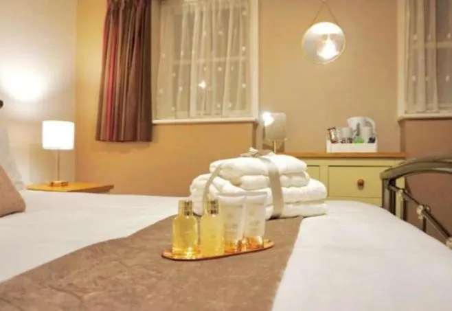 Bed in Stratton Cottage Guesthouse