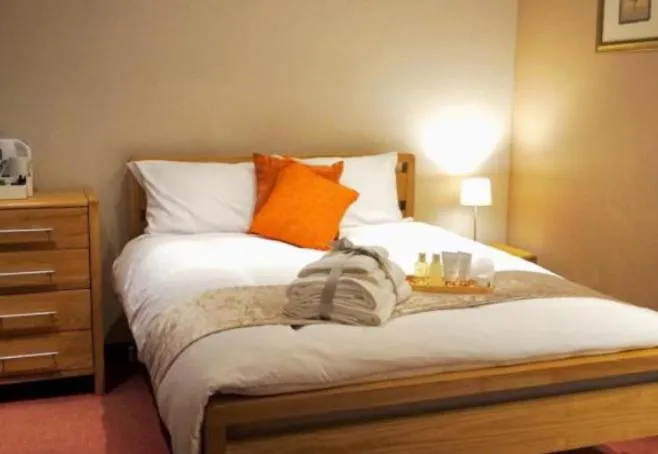 Bed in Stratton Cottage Guesthouse