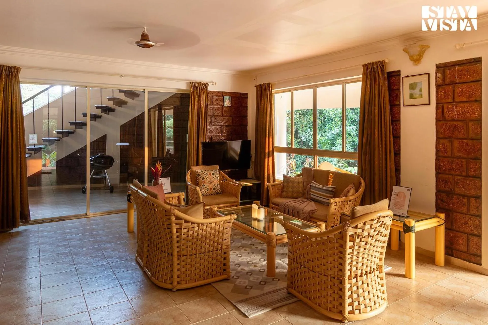 Living room in StayVista at The Conservancy Bungalow - Koynanagar
