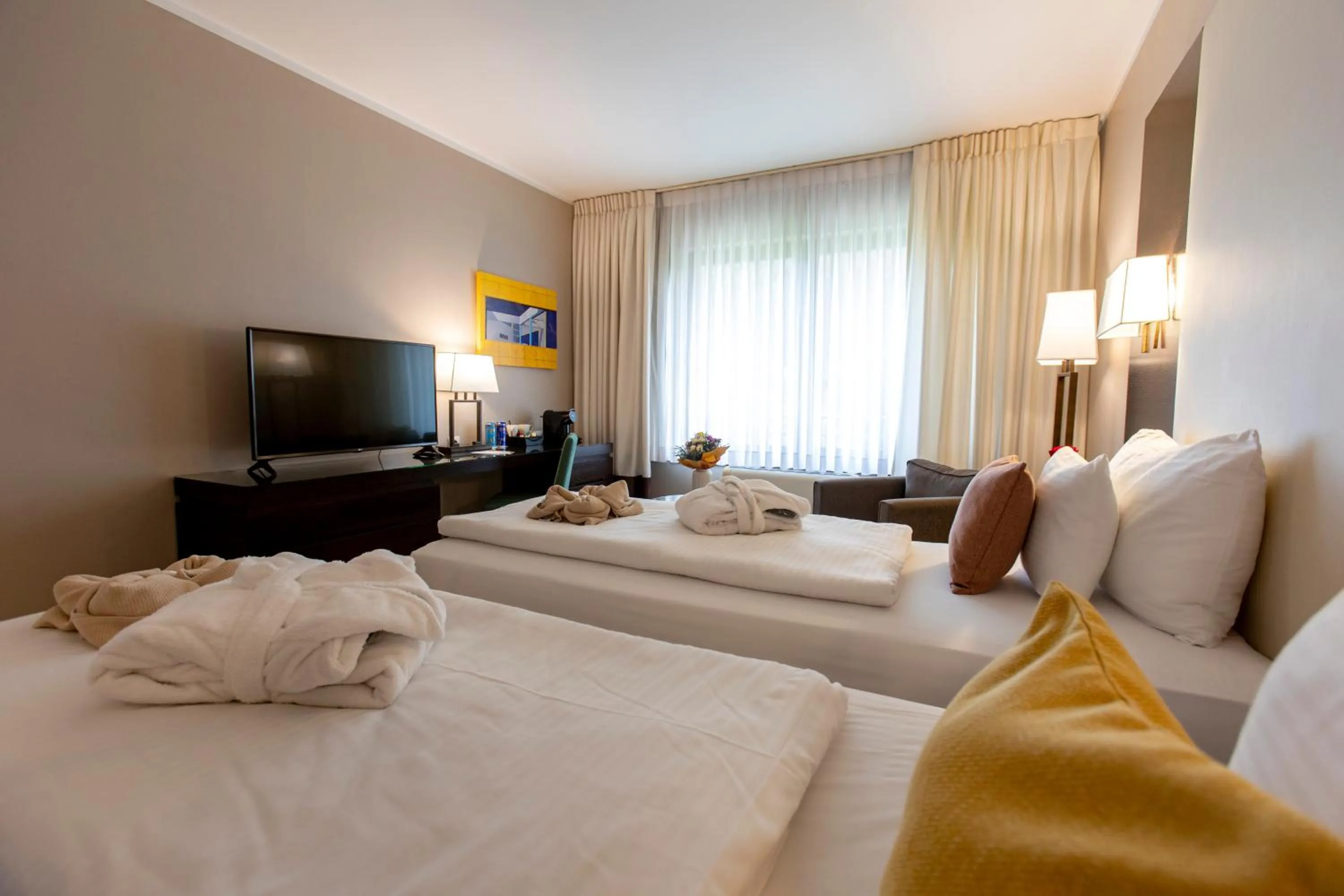 Bed in Lion's Garden Hotel