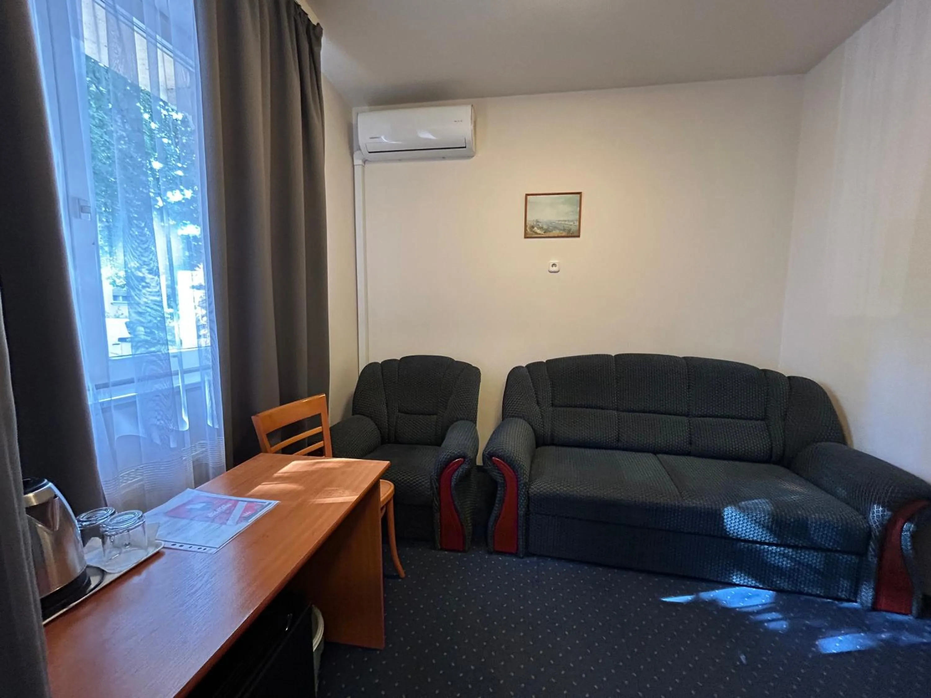 Living room in Corvin Hotel