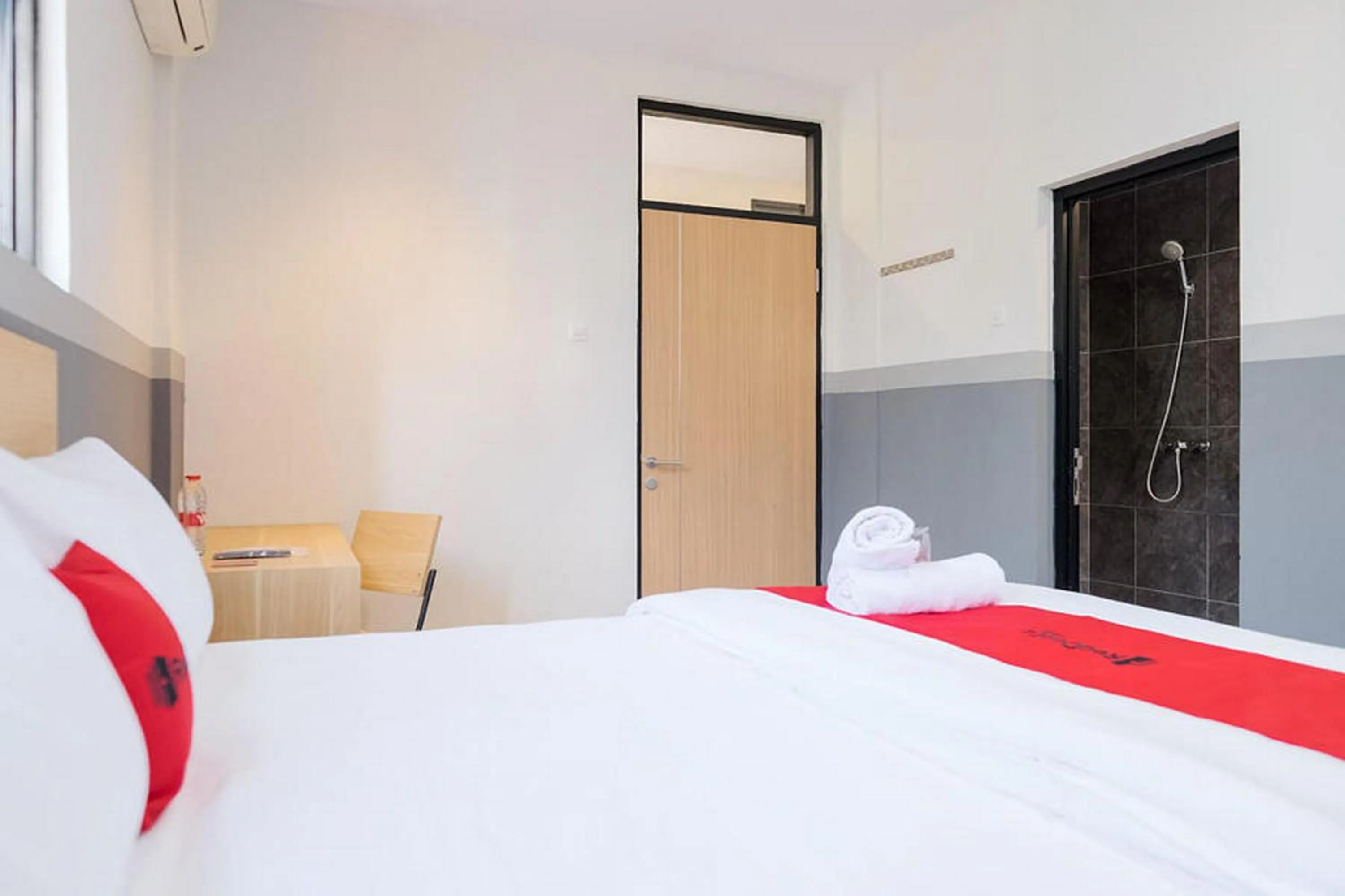 Bed in RedDoorz Plus near Taman Anggrek Mall
