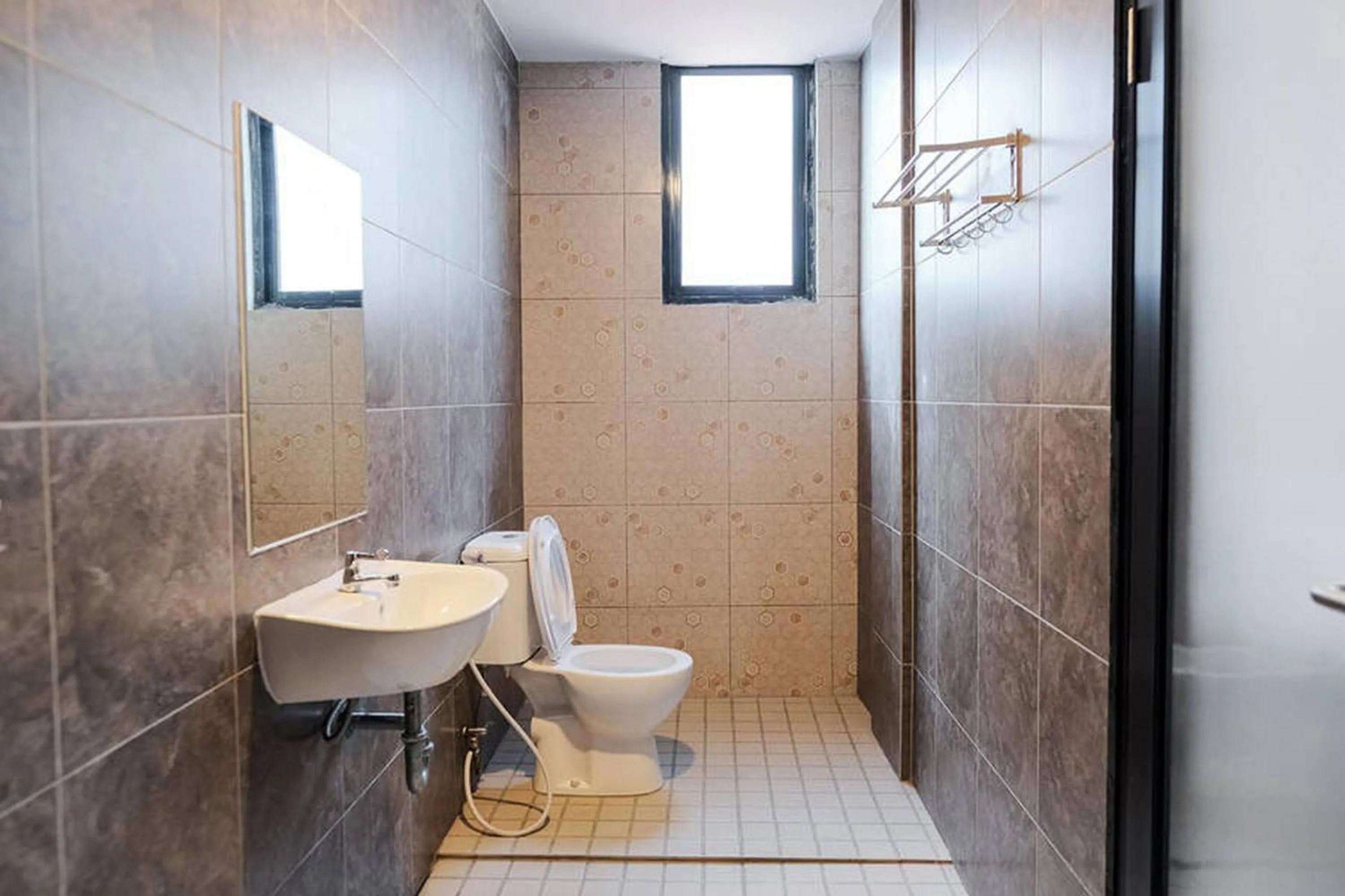 Bathroom in RedDoorz Plus near Taman Anggrek Mall