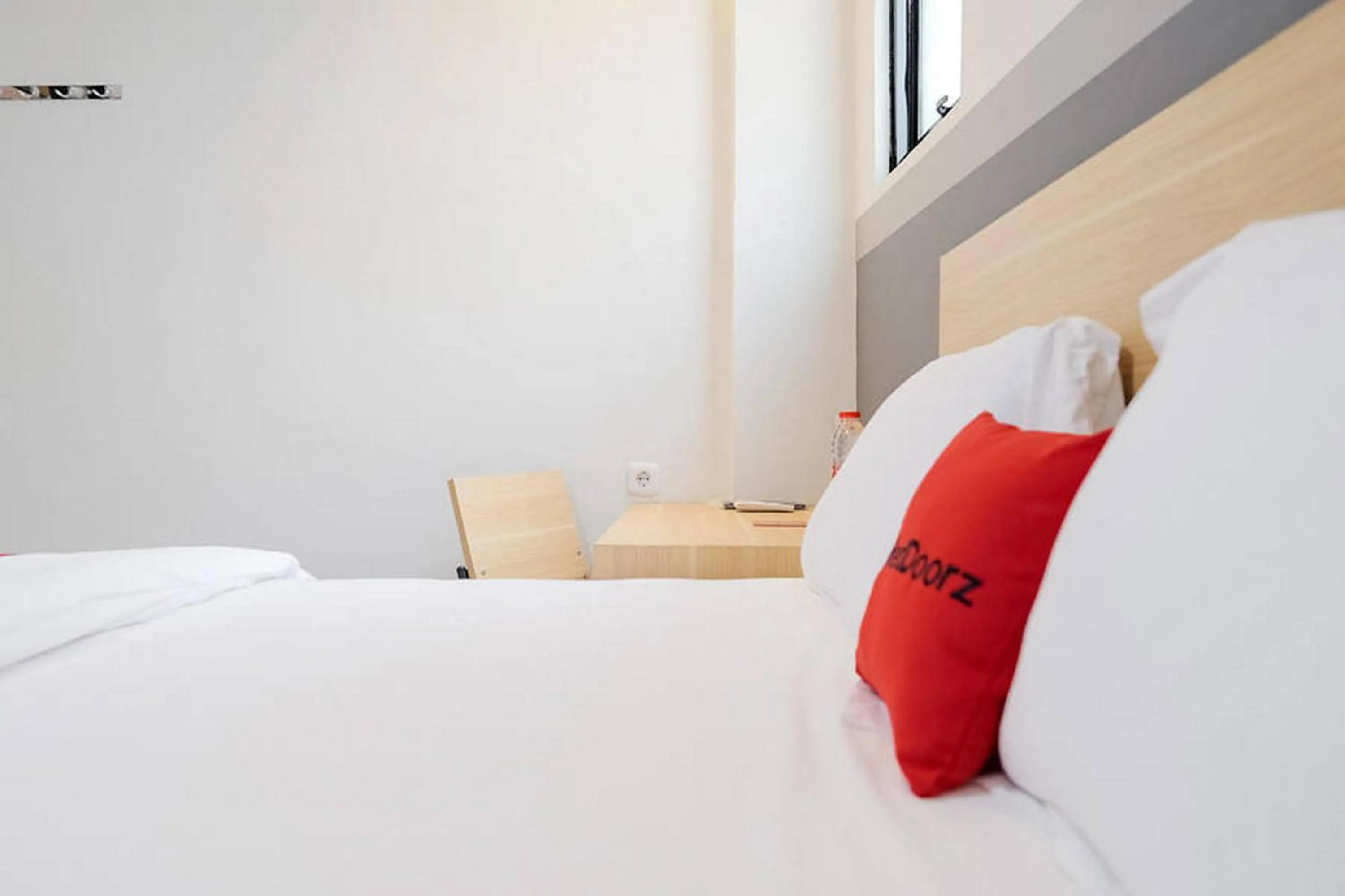 Bed in RedDoorz Plus near Taman Anggrek Mall