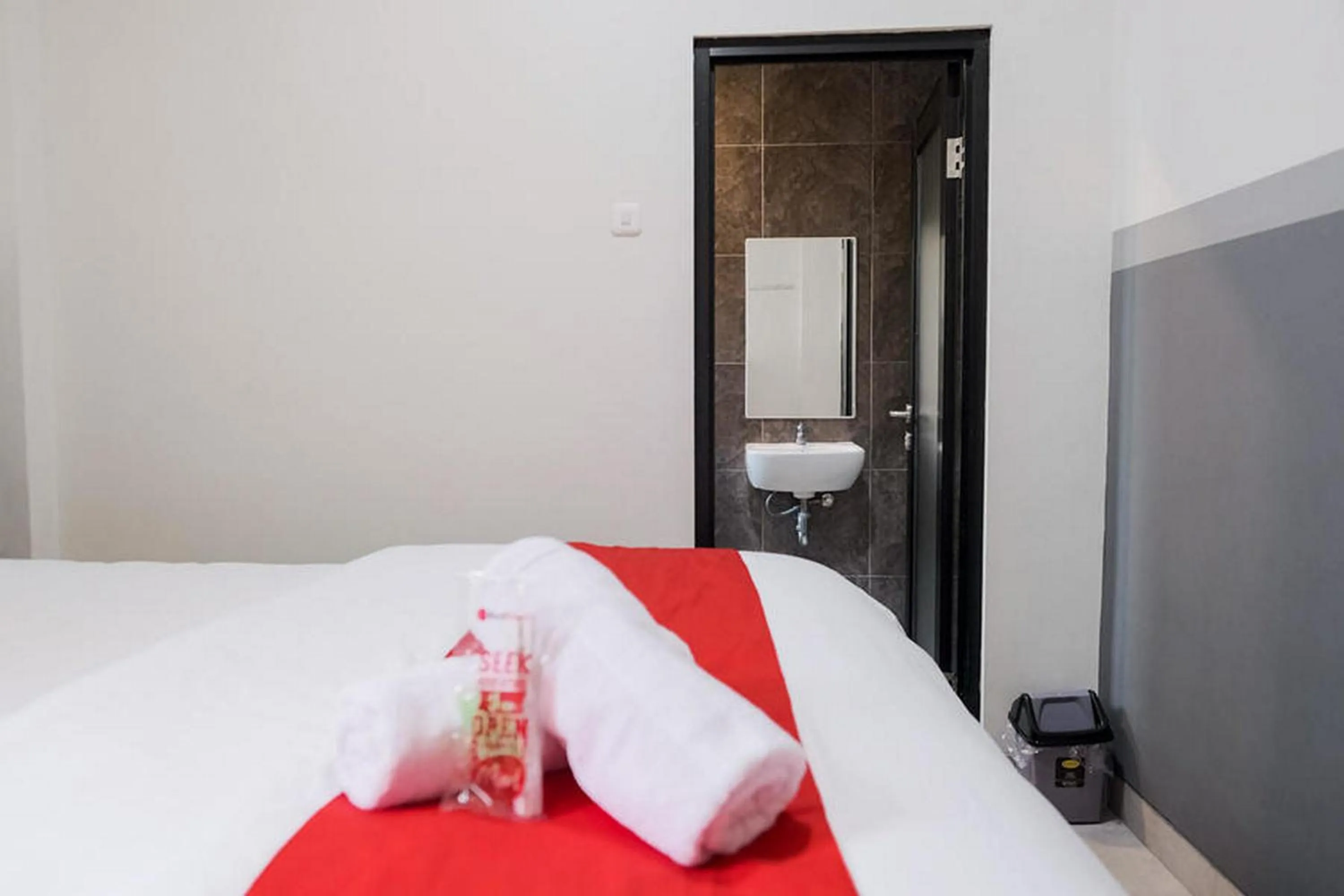 Bed in RedDoorz Plus near Taman Anggrek Mall
