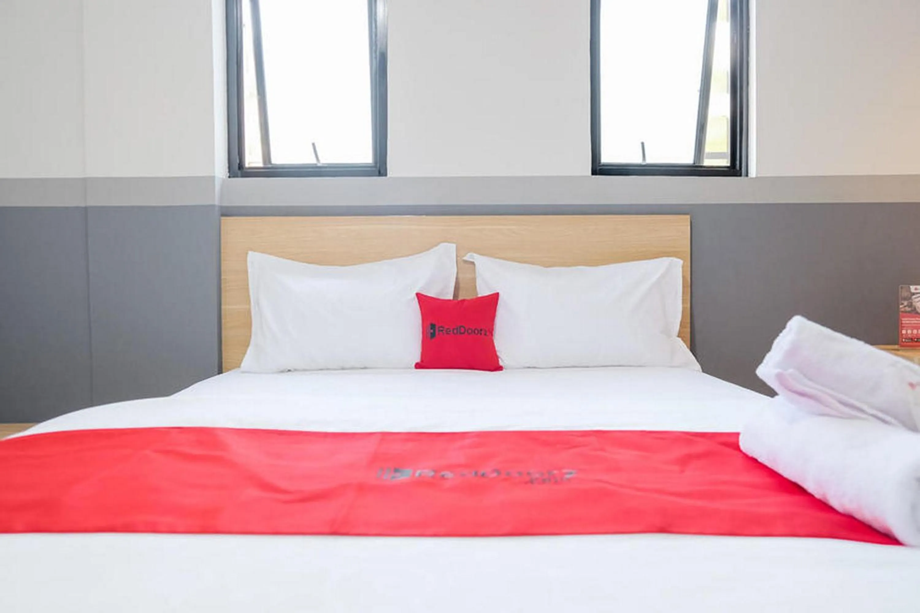 Bed in RedDoorz Plus near Taman Anggrek Mall