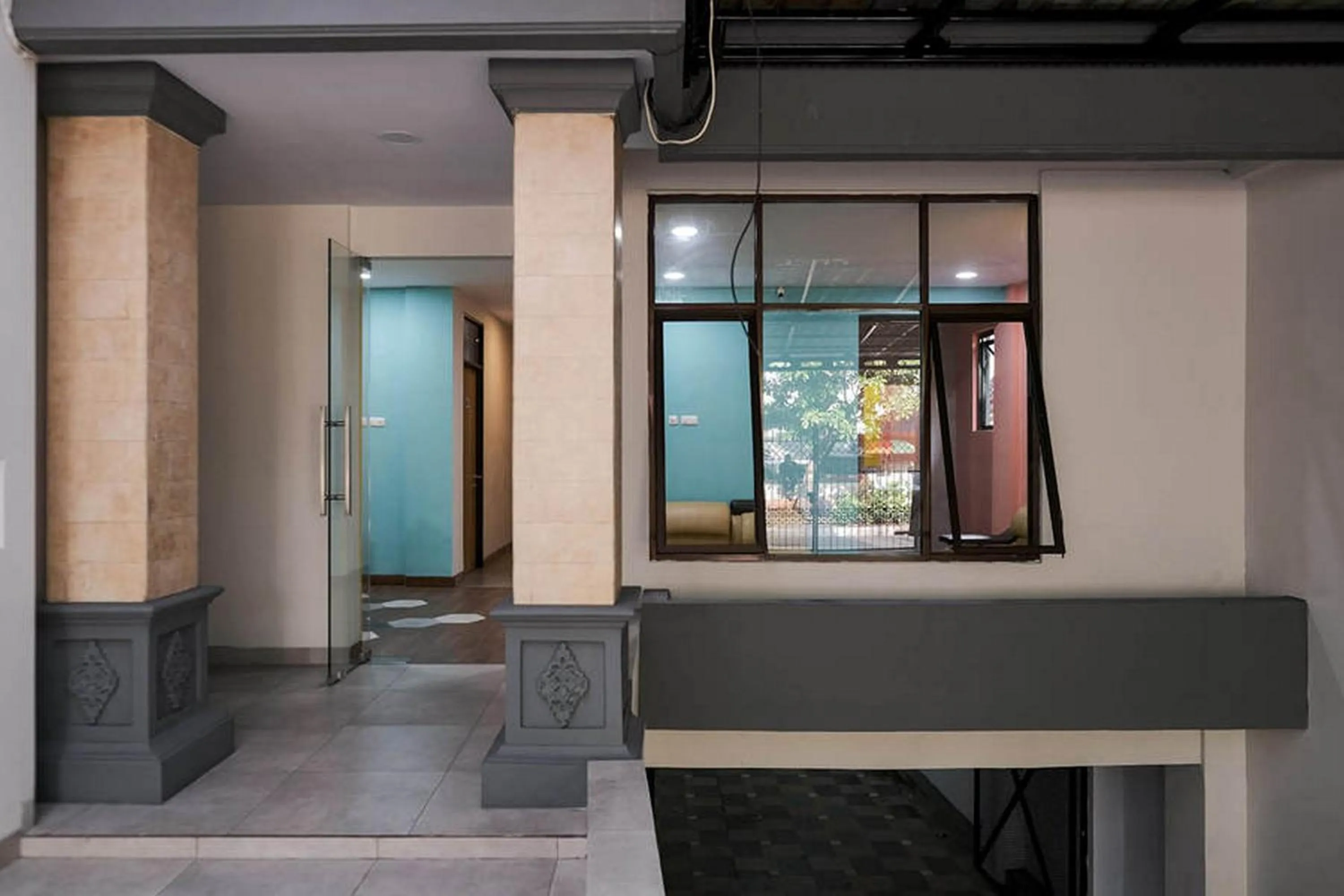 Facade/entrance in RedDoorz Plus near Taman Anggrek Mall