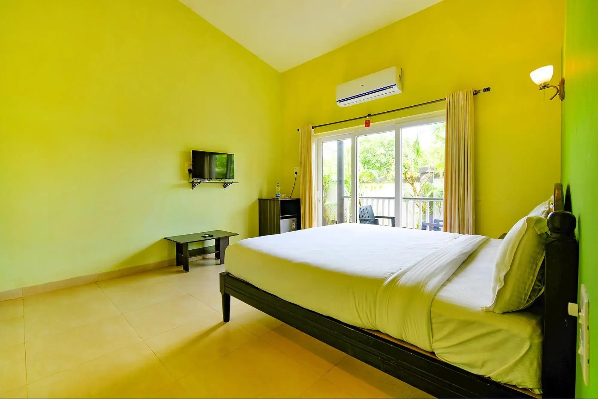 Bed in FabEscape Vagator Retreat Resort With Swimming Pool - Nr Vagator Beach Bed in FabEscape Vagator Retreat Resort With Swimming Pool - Nr Vagator Beach