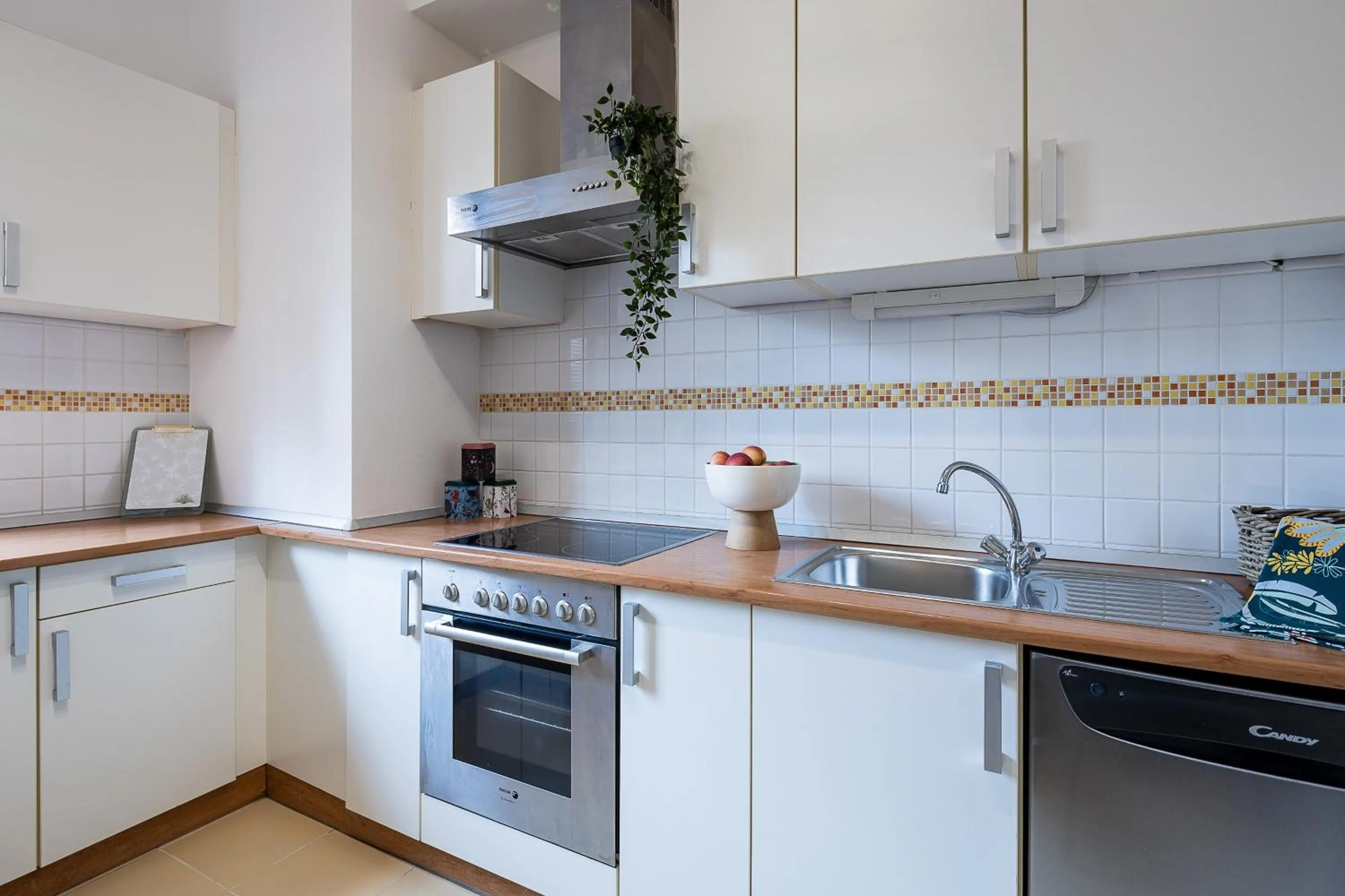kitchen in Central Passage Apartments by Vagabond Downtown