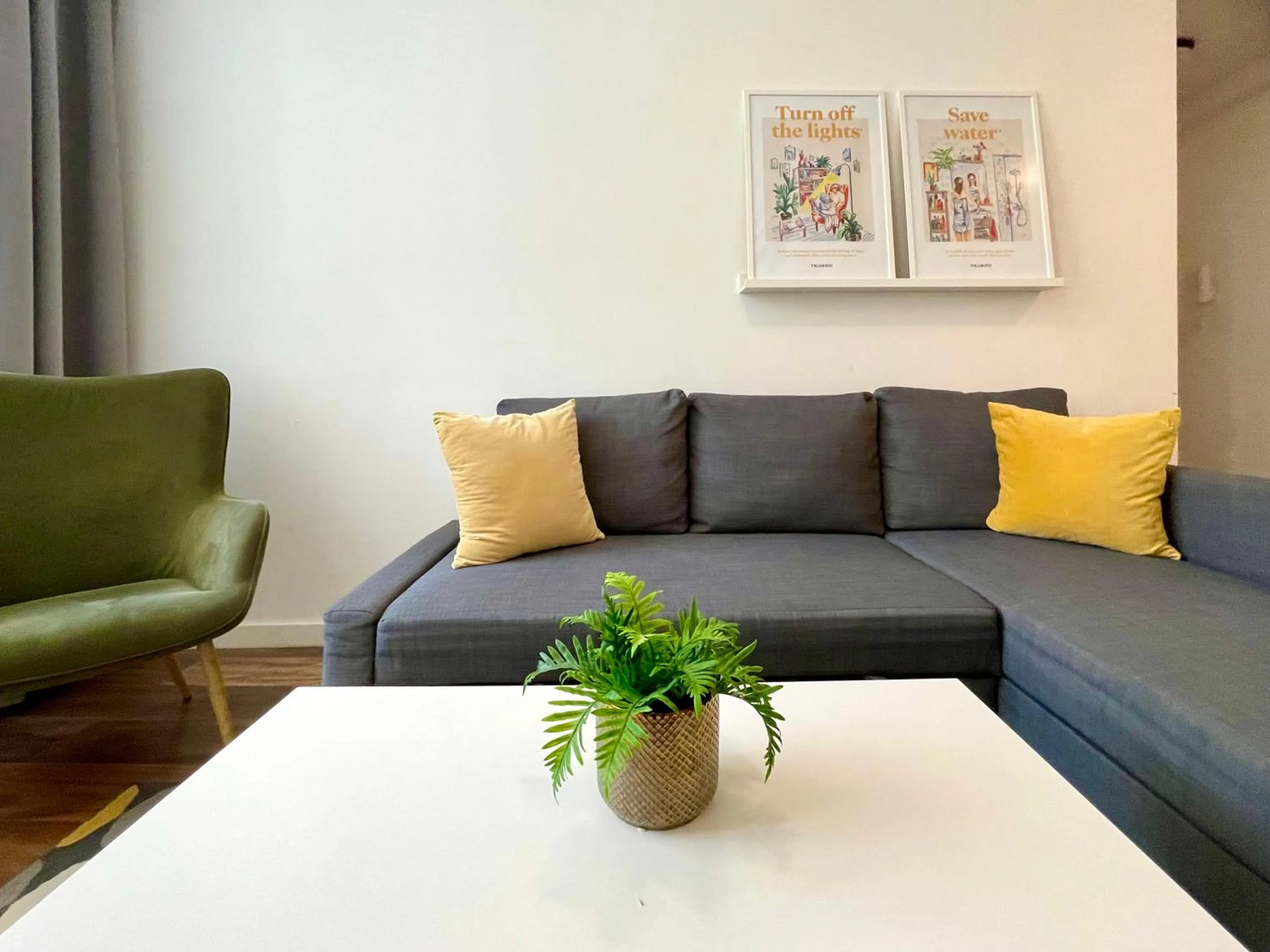 Living room in Central Passage Apartments by Vagabond Downtown