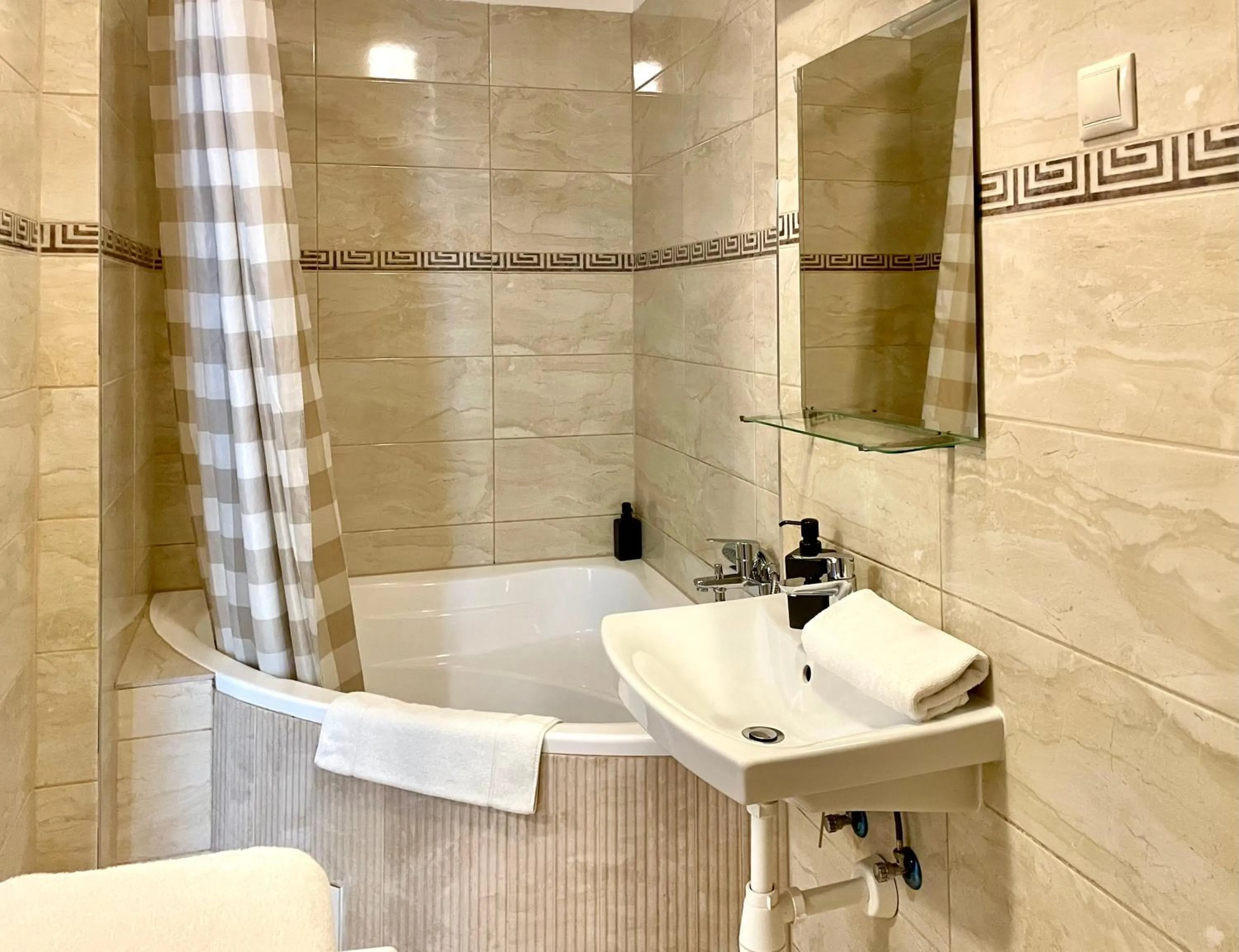 Bathroom in Central Passage Apartments by Vagabond Downtown