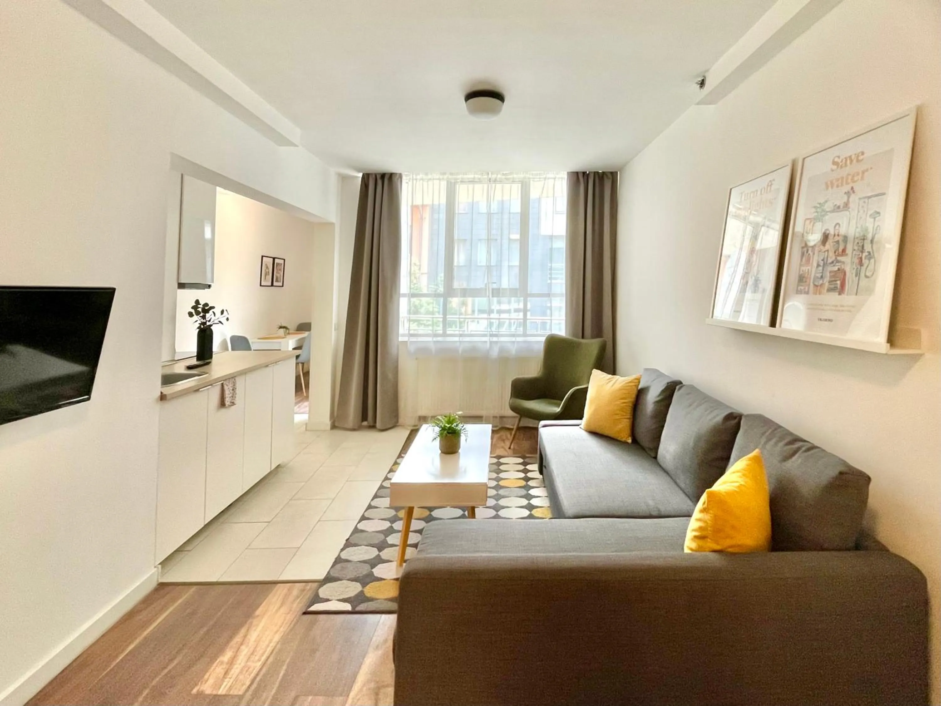 Living room in Central Passage Apartments by Vagabond Downtown