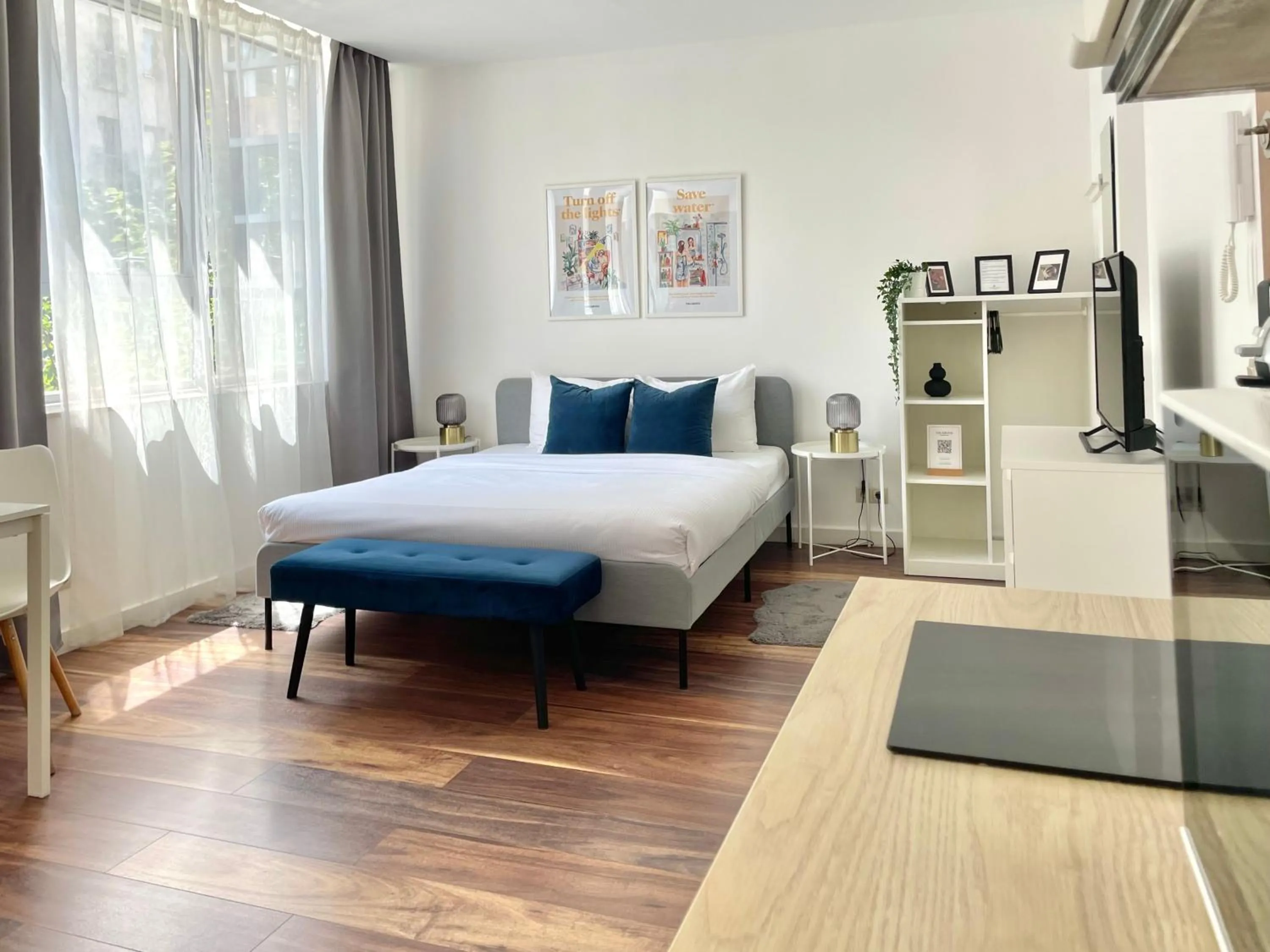 Photo of the whole room, Bed in Central Passage Apartments by Vagabond Downtown