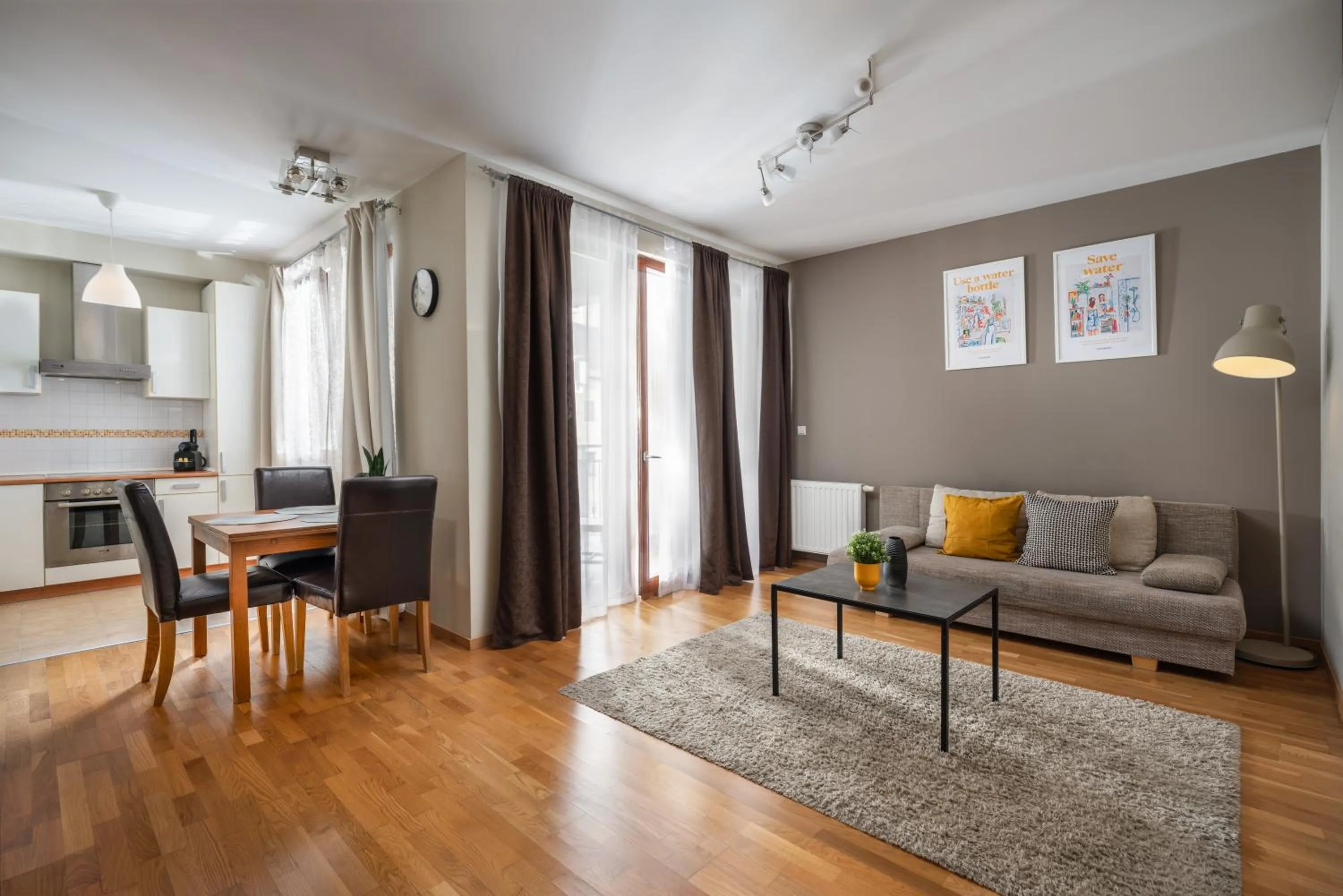 Living room in Central Passage Apartments by Vagabond Downtown