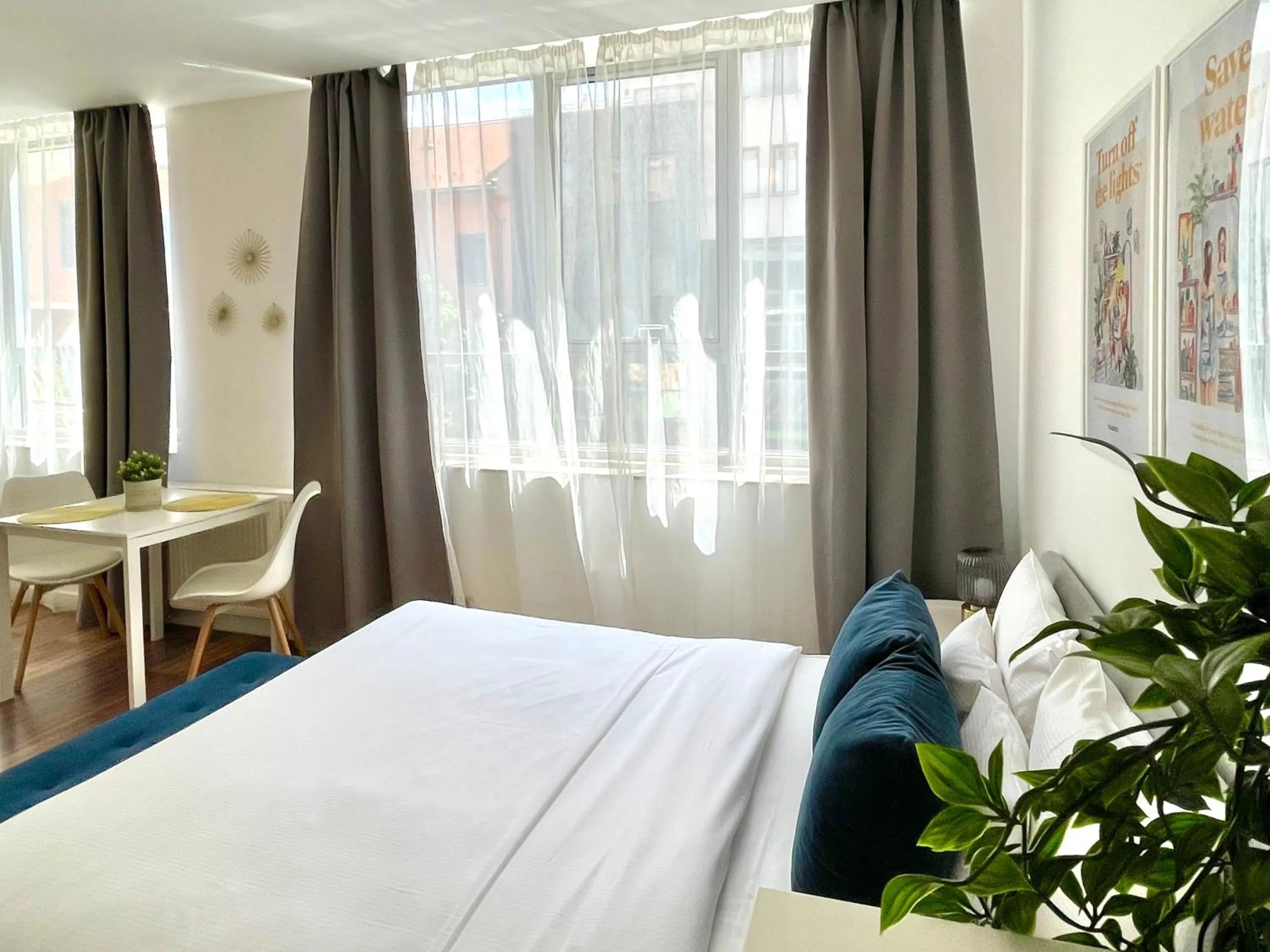 Photo of the whole room, Bed in Central Passage Apartments by Vagabond Downtown