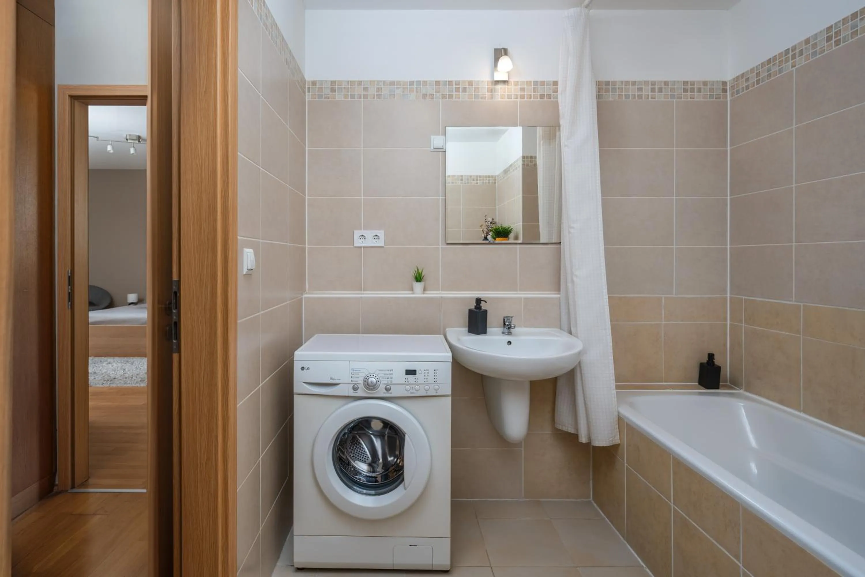 Bathroom in Central Passage Apartments by Vagabond Downtown