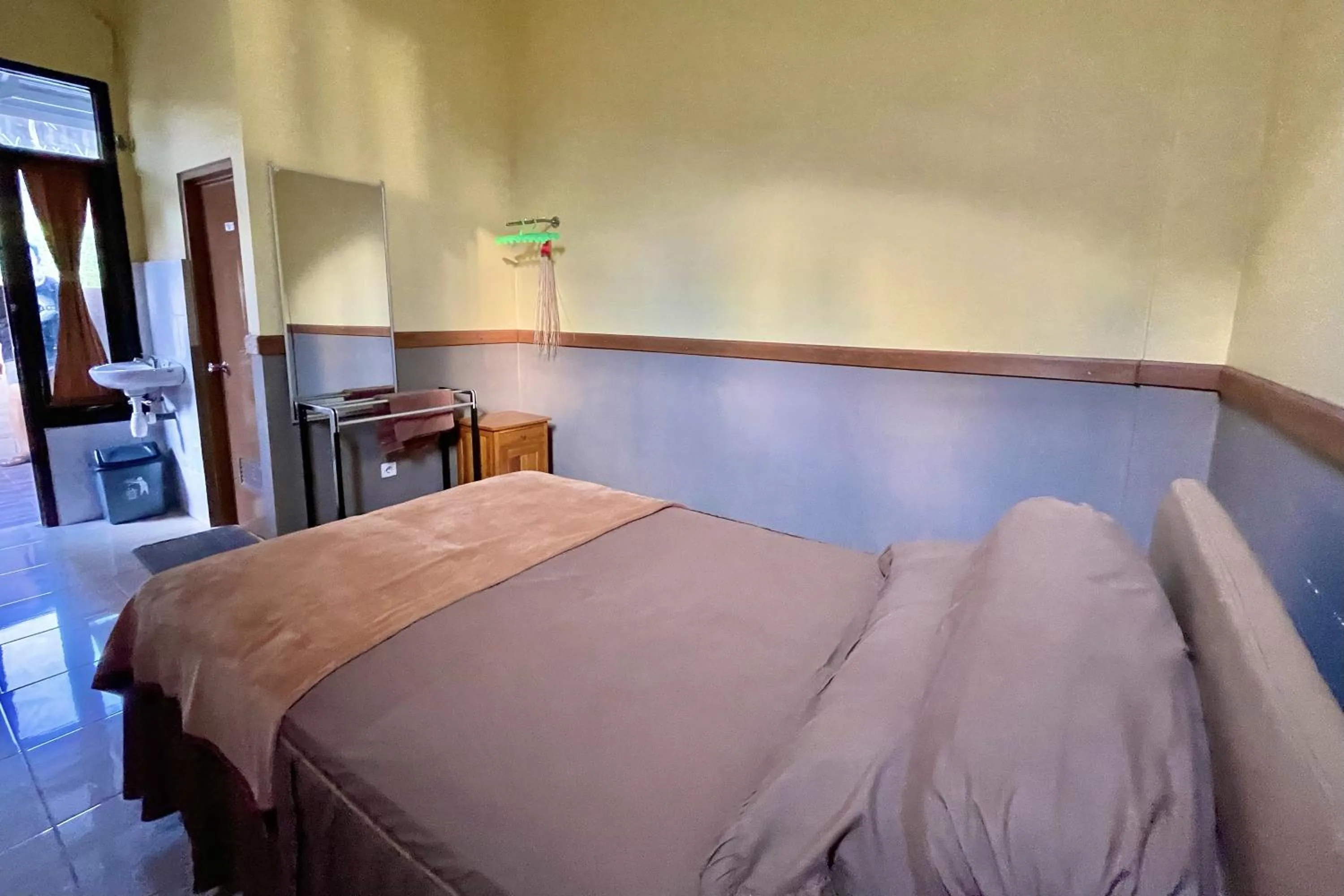 Bed in Mongan Homestay Beside The Belulang Hot Spring