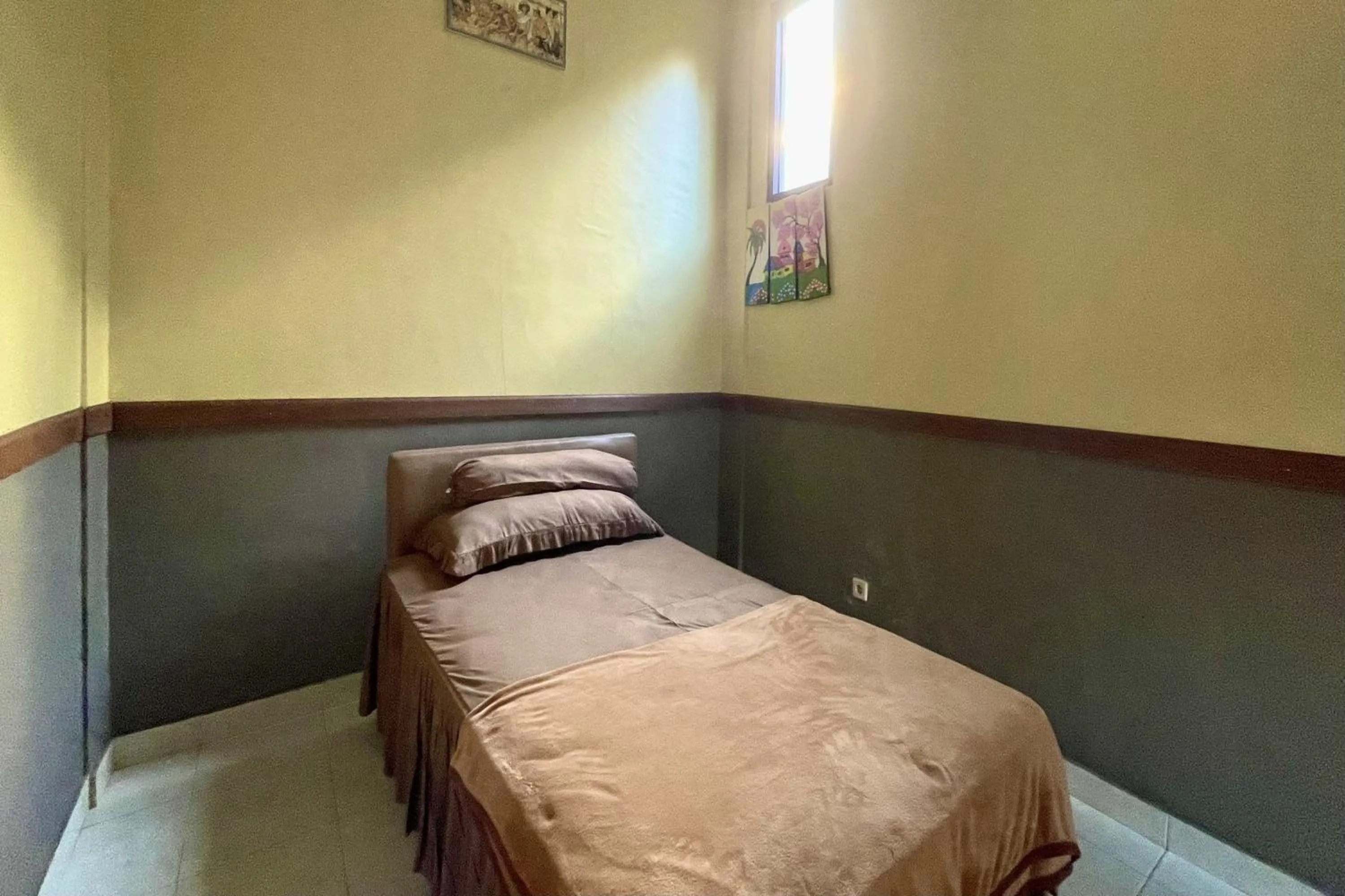 Bed in Mongan Homestay Beside The Belulang Hot Spring