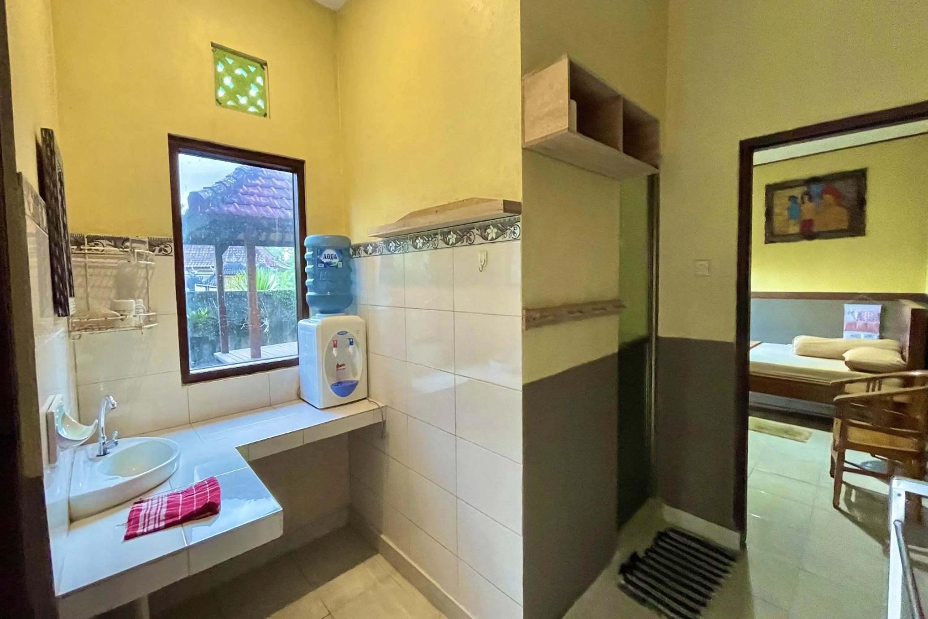 Kitchen or kitchenette in Mongan Homestay Beside The Belulang Hot Spring