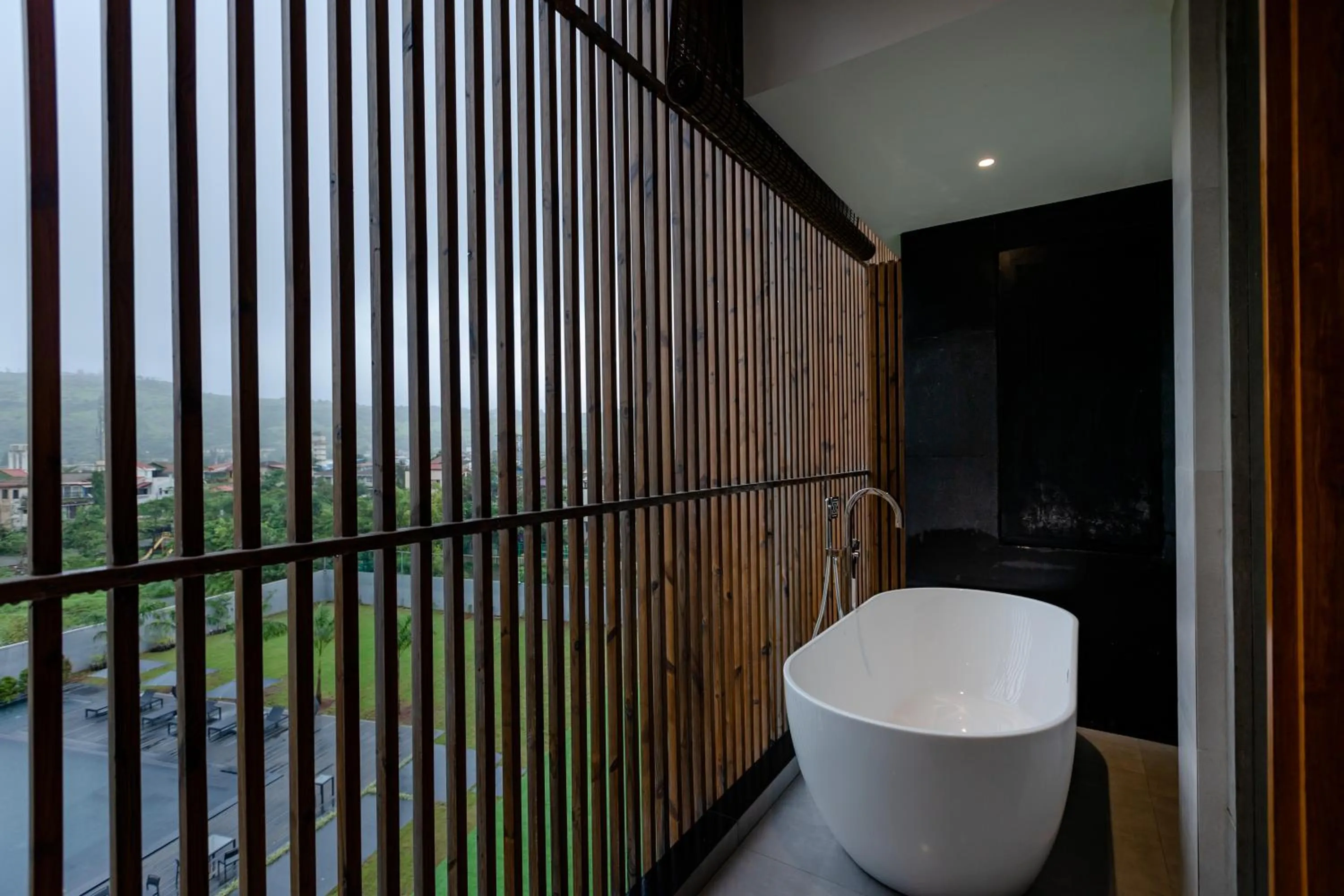 Bath in Radisson Resort and Spa Lonavala