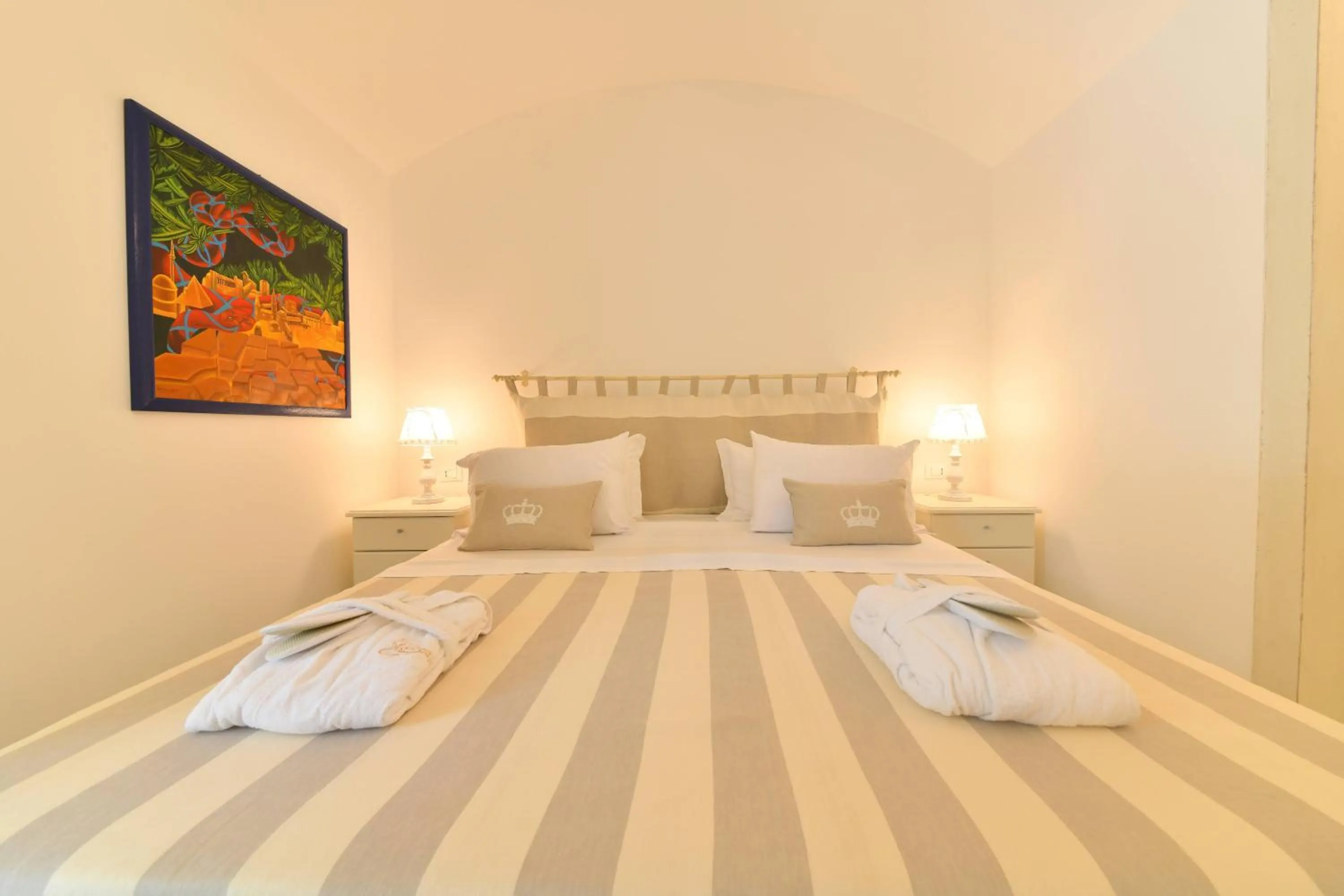 Bed in Queen Suite - Luxury Rooms